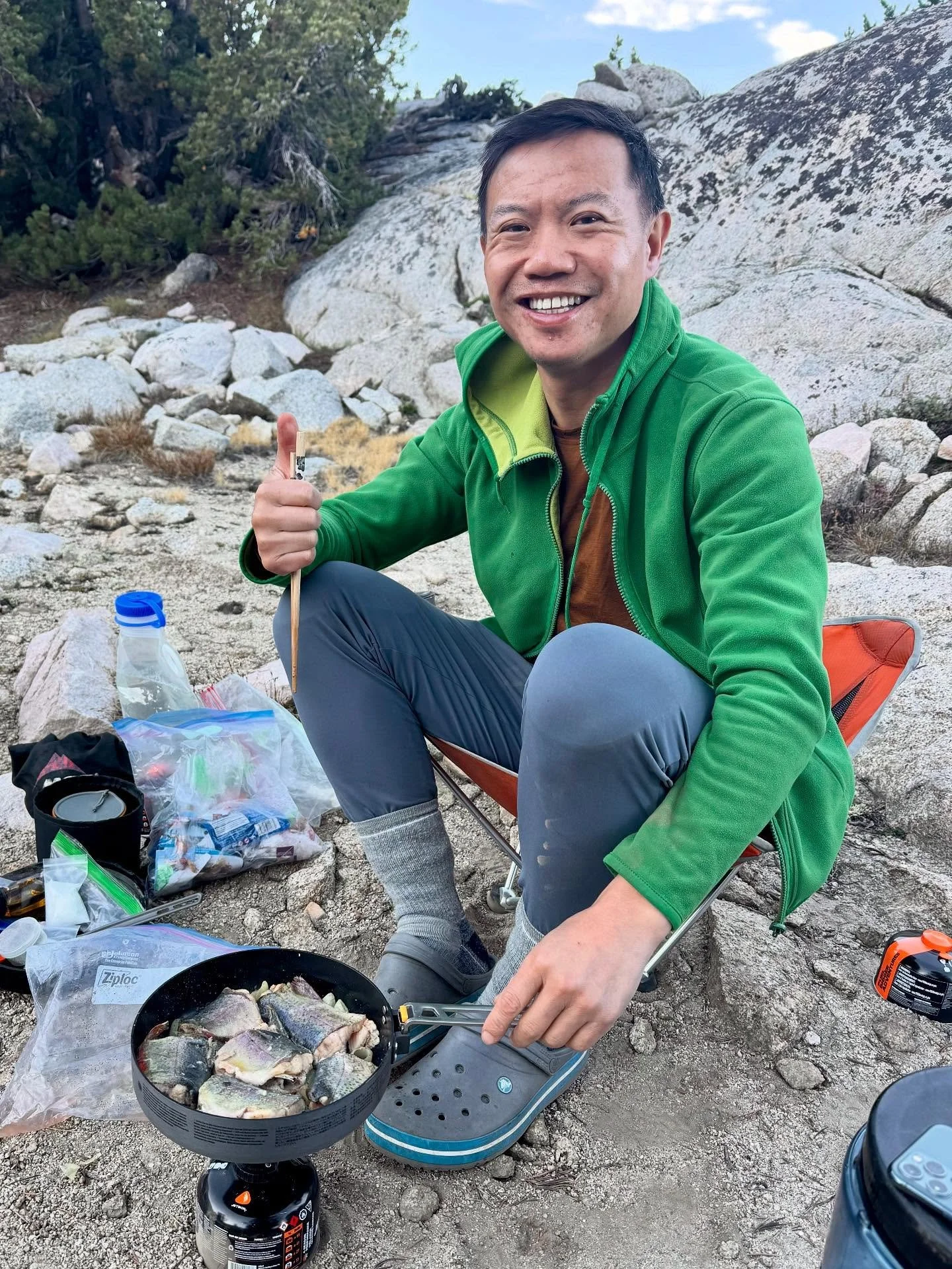 Fishing and cooking trout in the backcountry of the High Sierra Mountains.