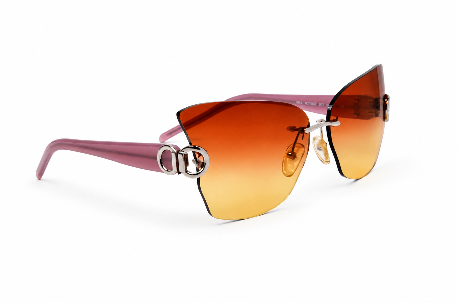 Sleek rimless sunglasses with pink temples.png