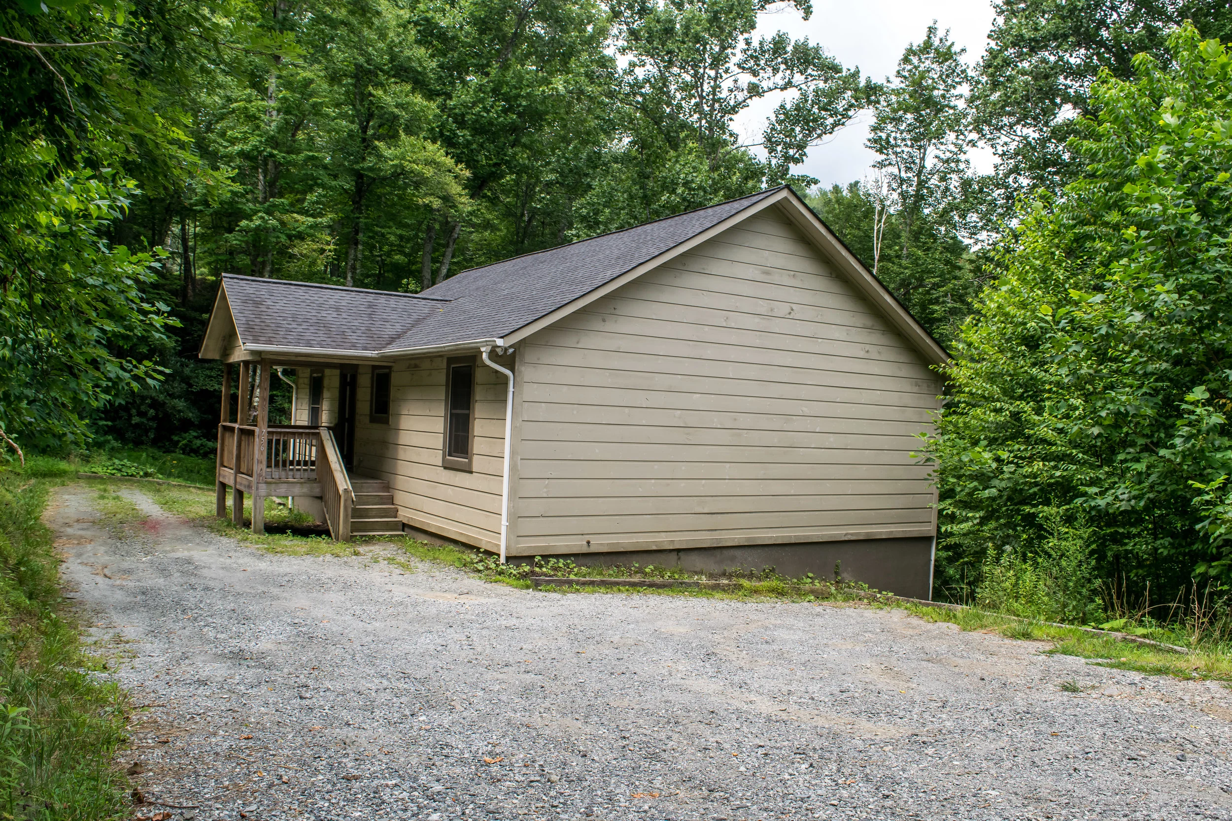 Hidden hideout with plenty of parking and a spectacular view from the back deck.