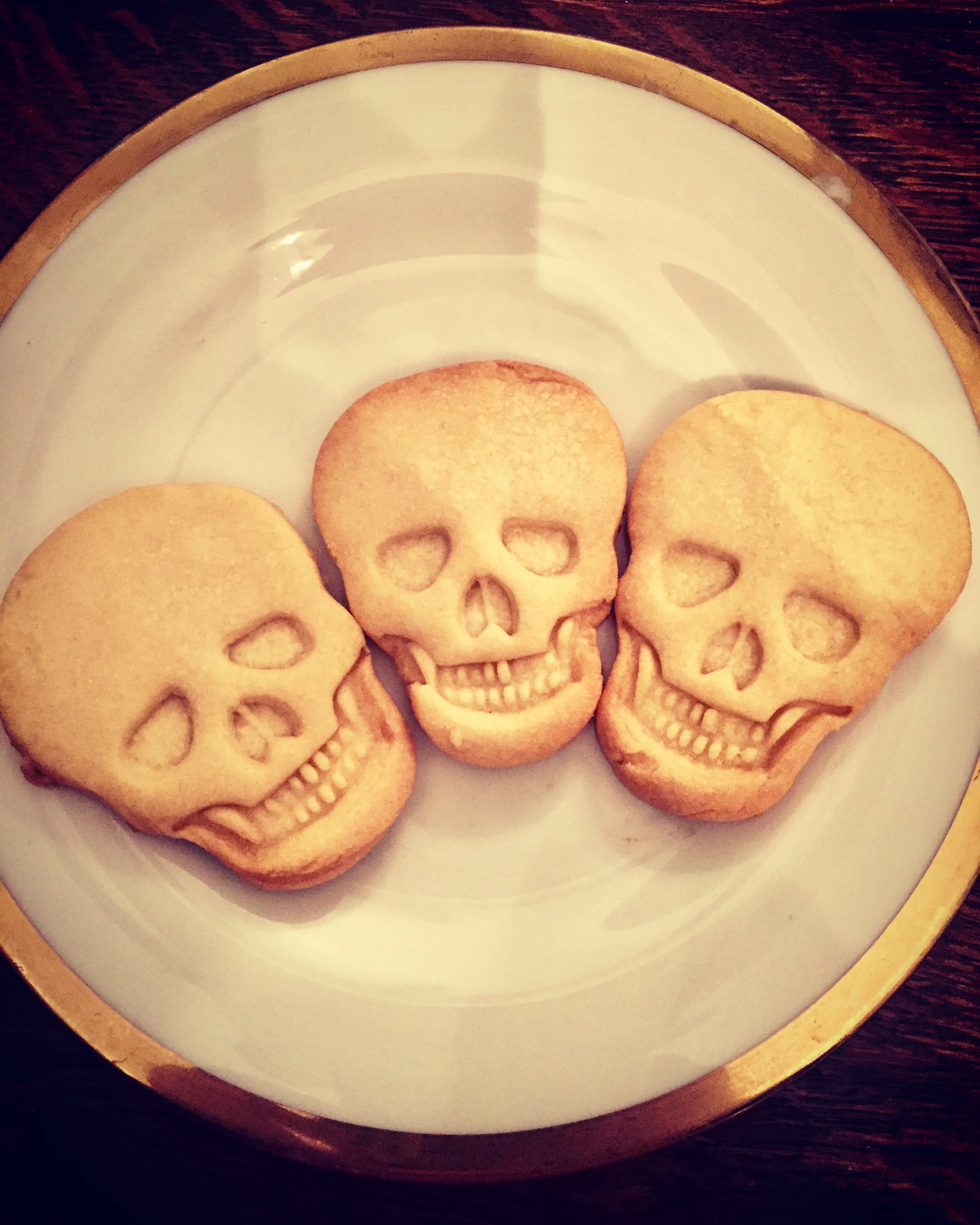 I know these aren't doughnuts, but making skull cookies is my other obsession.