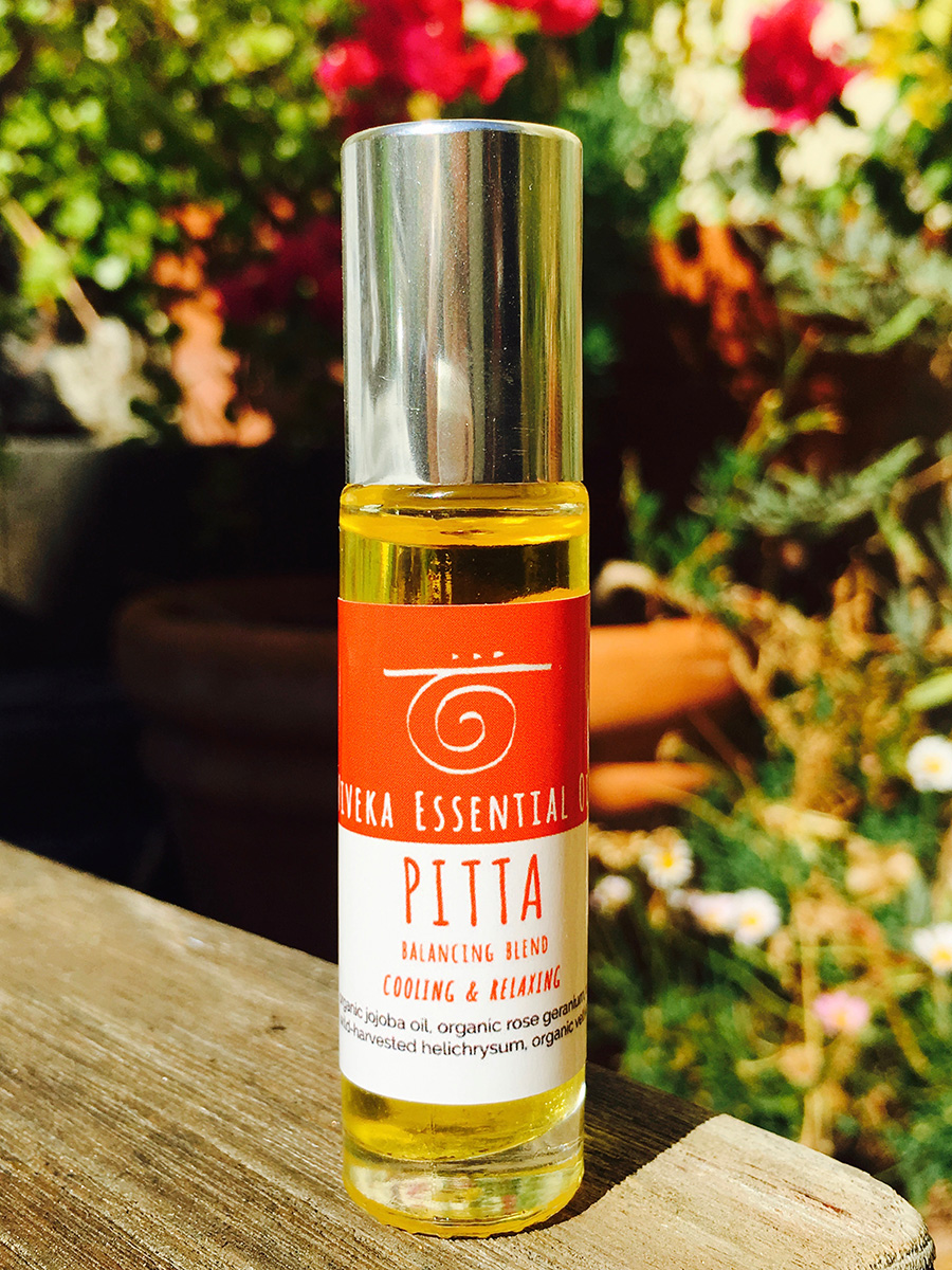 PITTA BALANCING BLEND Organic Jojoba oil (unrefined/cold pressed), organic Rose Geranium (South Africa), wild-harvested Sandalwood (Vanuatu), wild-harvested Helichrysum (Croatia), Vetiver (Haiti). The Pitta blend has cooling, relaxing and calming properties to balance the hot and sharp qualities of Pitta. Rose Geranium has cooling properties, uplifts the spirit and promotes a feeling of well-being and vitality. Sandalwood’s tree resin is famous for releasing stress, anger and irritability with it’s cooling, balancing and relaxing effects. In Ayurveda Sandalwood is considered bitter, sweet, and astringent. Helichrysum is flower oil with potent anti-inflammatory properties. It’s topical application promotes skin healing and tissue regeneration. It soothes muscle and joint pain, supports clarity and calms nerves. Vetiver serves to ground and relax in this blend.