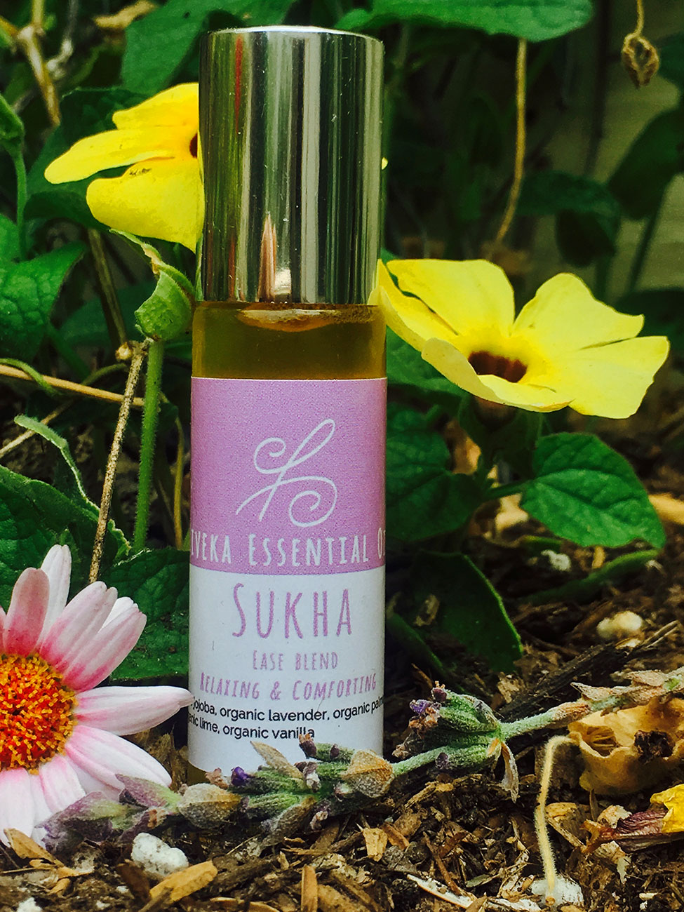 SUKHA EASE BLEND Lavender Oil (organic, Bulgaria): cooling, relaxing & uplifting, helpful in overcoming anger, irritation and insecurity. Palmarosa Oil (organic, Ethiopia): sweet & lemony-herbaceous, calming & uplifting, provides comfort, cooling & moistening. Neroli (organic, Morocco): light, delicate & sweet, lifts the mood, soothing to mind & heart, promotes deep, restful sleep. Lime (organic, South Africa): purifying & detoxifying, astringent, immune supporting, refreshing, induces positivity. Vanilla (organic, Madagascar): sensual, awakens joy, boosts confident and optimism, evocative