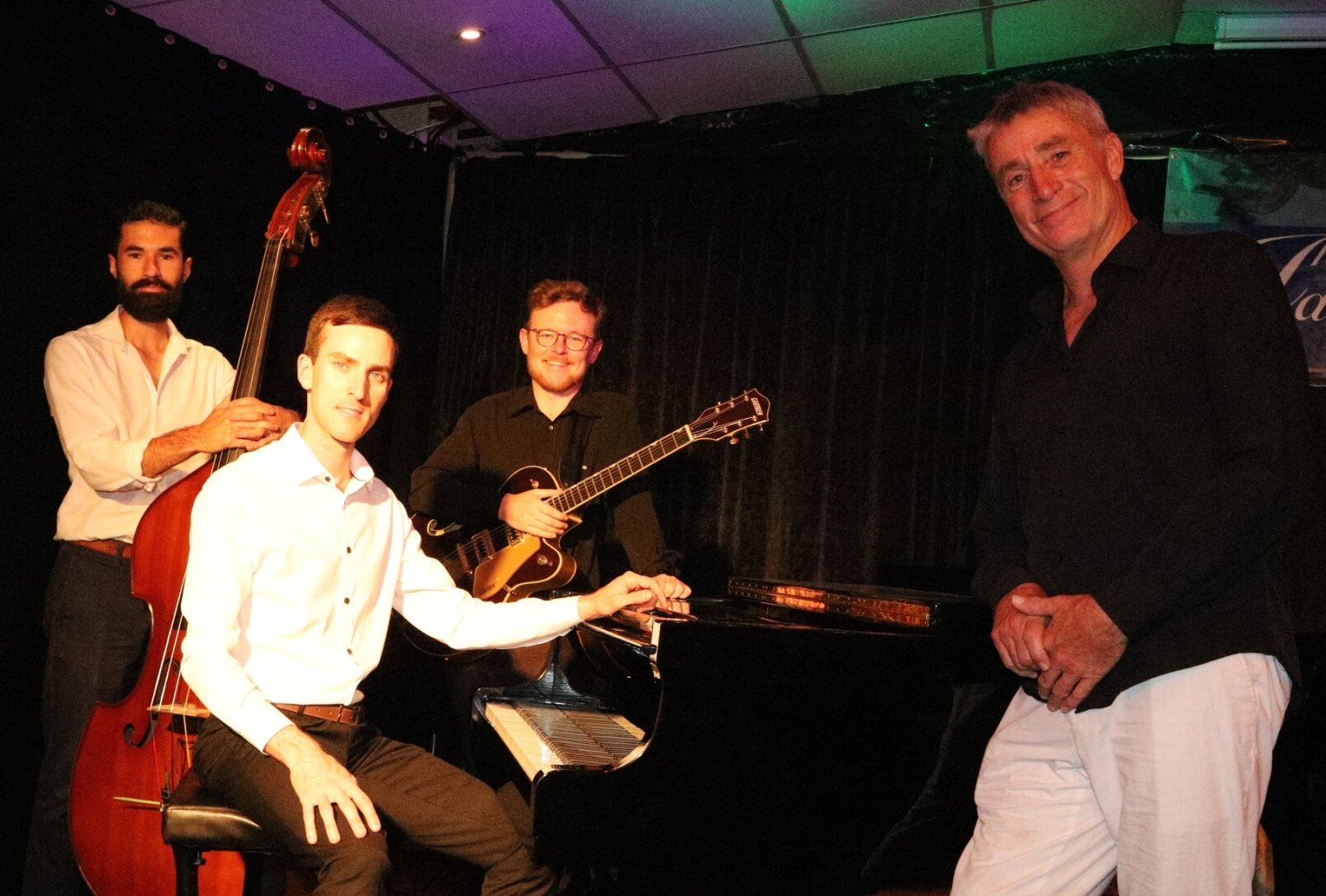 Cameron McArthur - double bass, Loris Zigon - piano, Sam Swindells - guitar, Mike Murane - vocals.