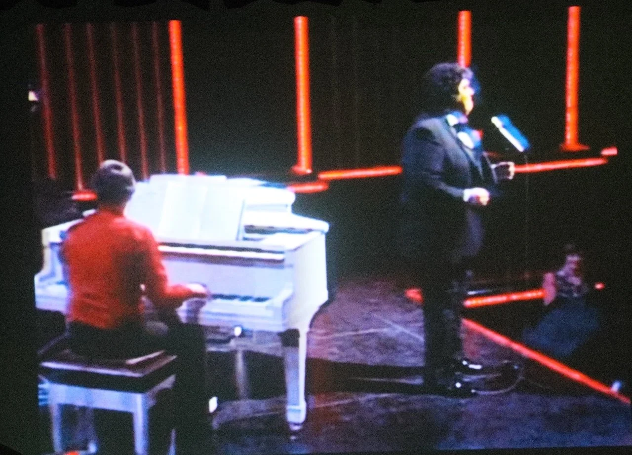 Mike Walker backing Ricky May - Mandalay - 1983. (photo from video shown during concert.)