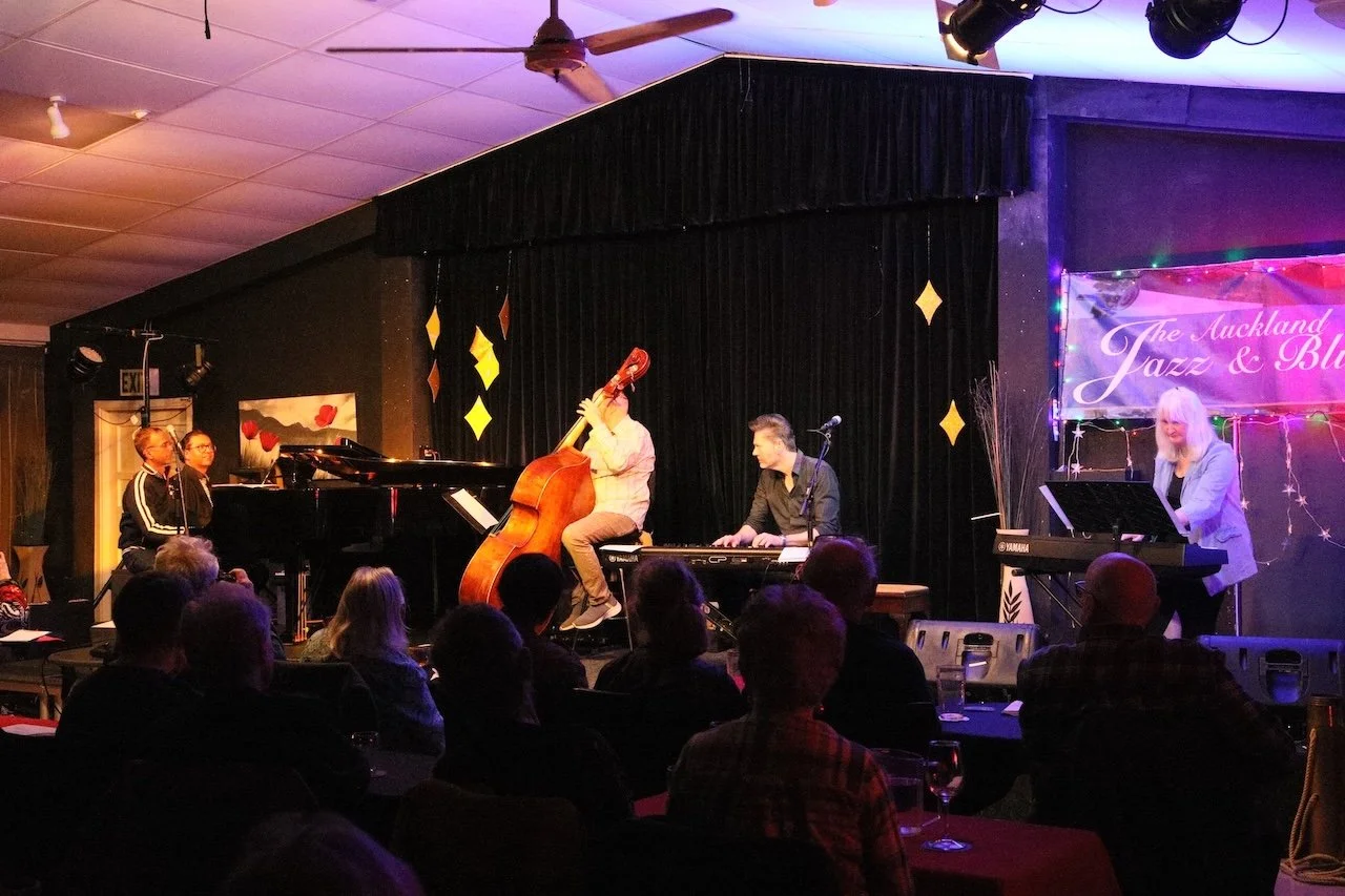 All pianists playing together to conclude the concert. 