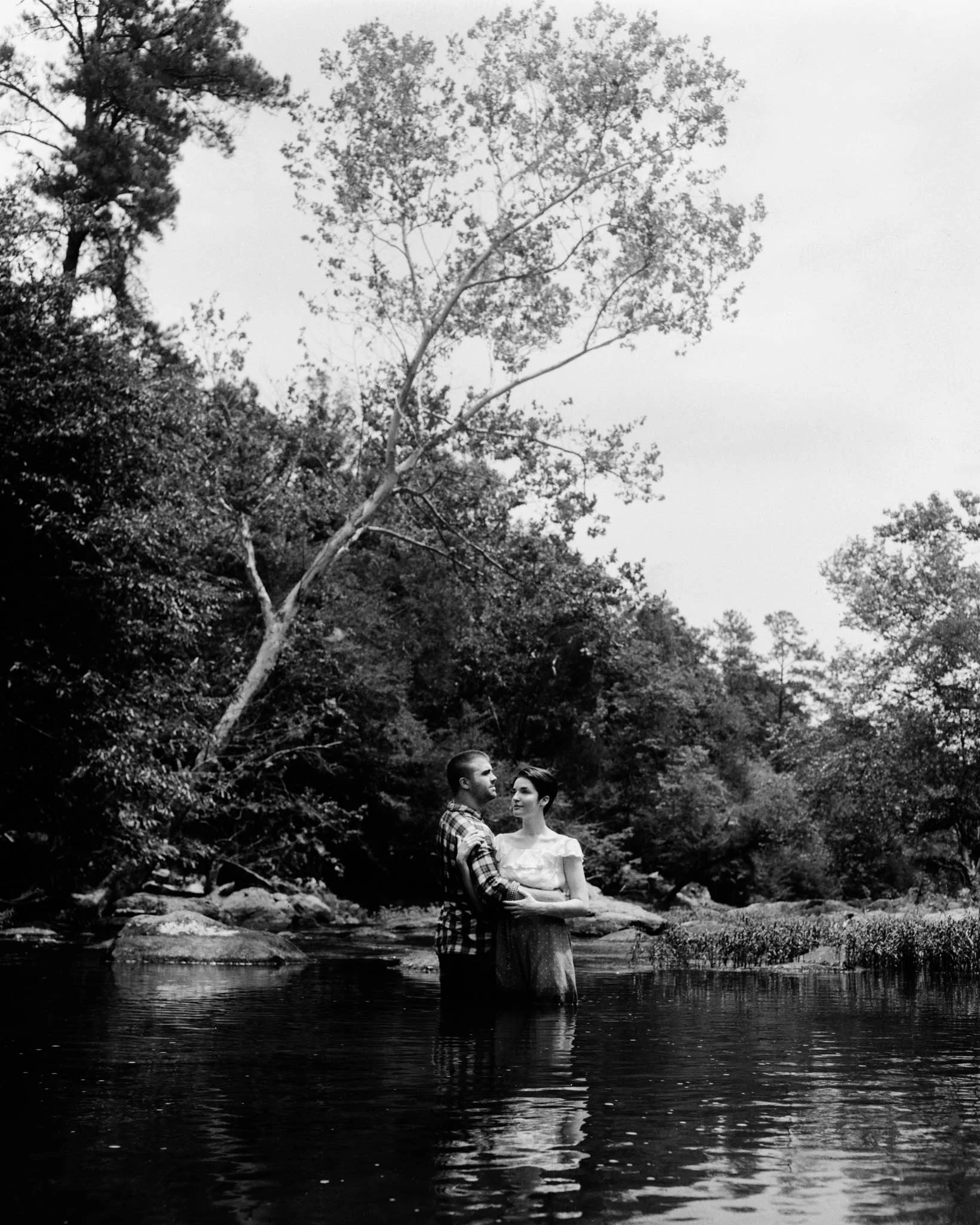 Couple Embracing During Eno River Session, Durham, NC