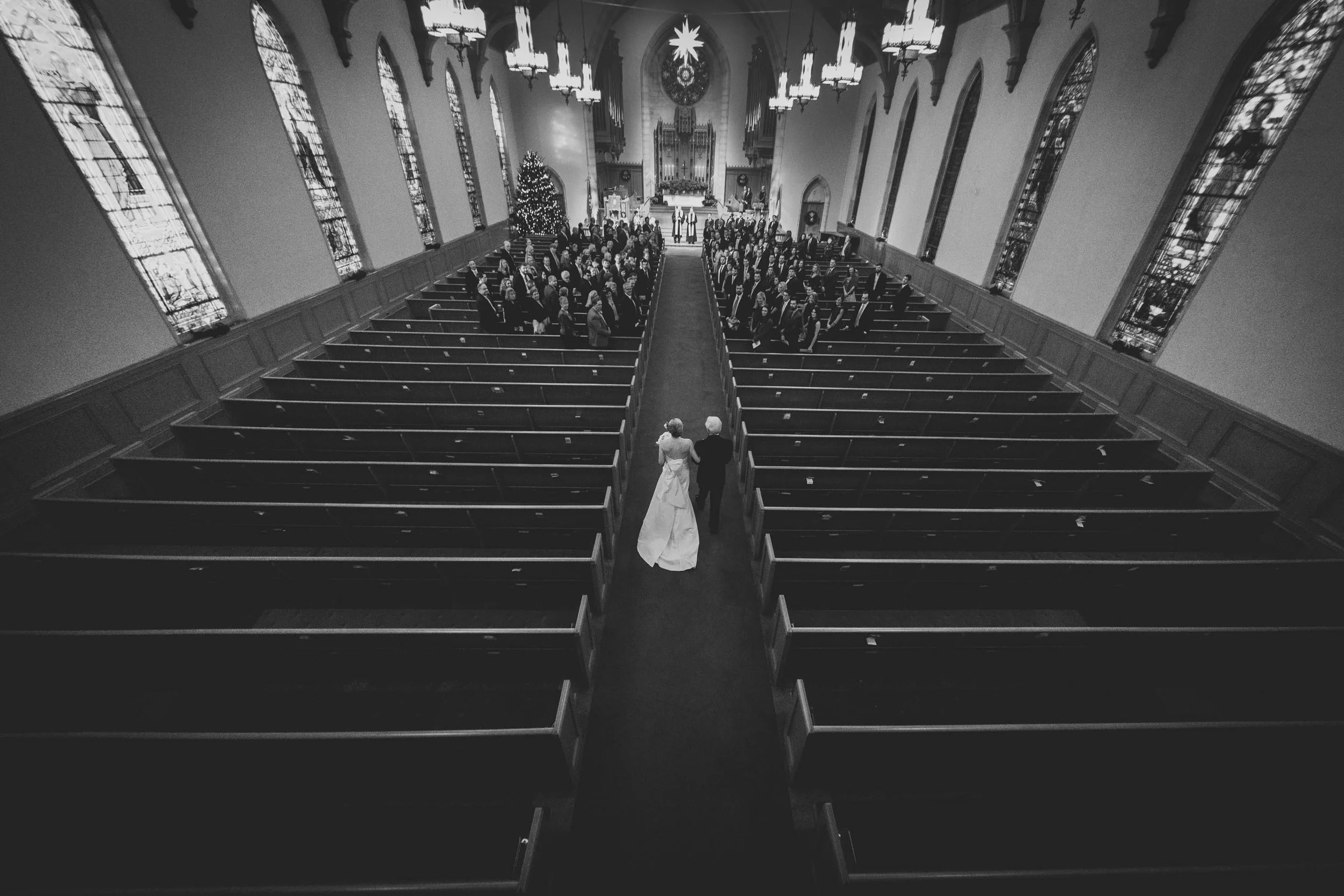 Father walking his daughter down the aisle at Edenton Street United Methodist Church, Raleigh, NC