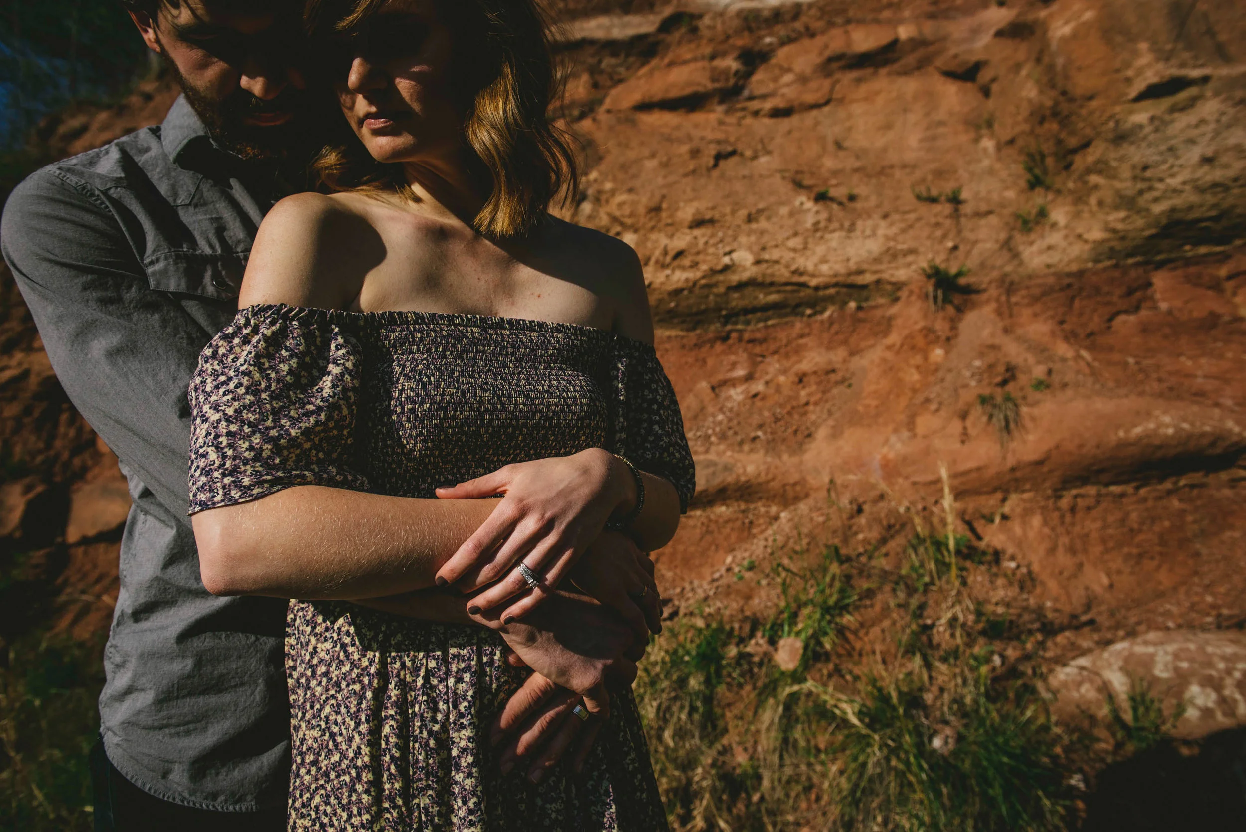 Couple embracing during their Raleigh engagement photo session