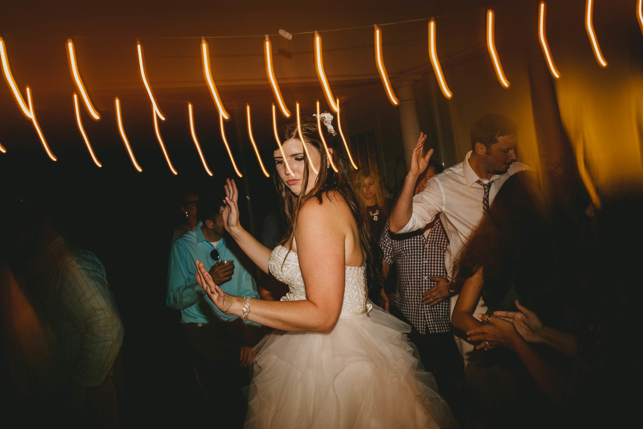 bride dancing during her wedding reception