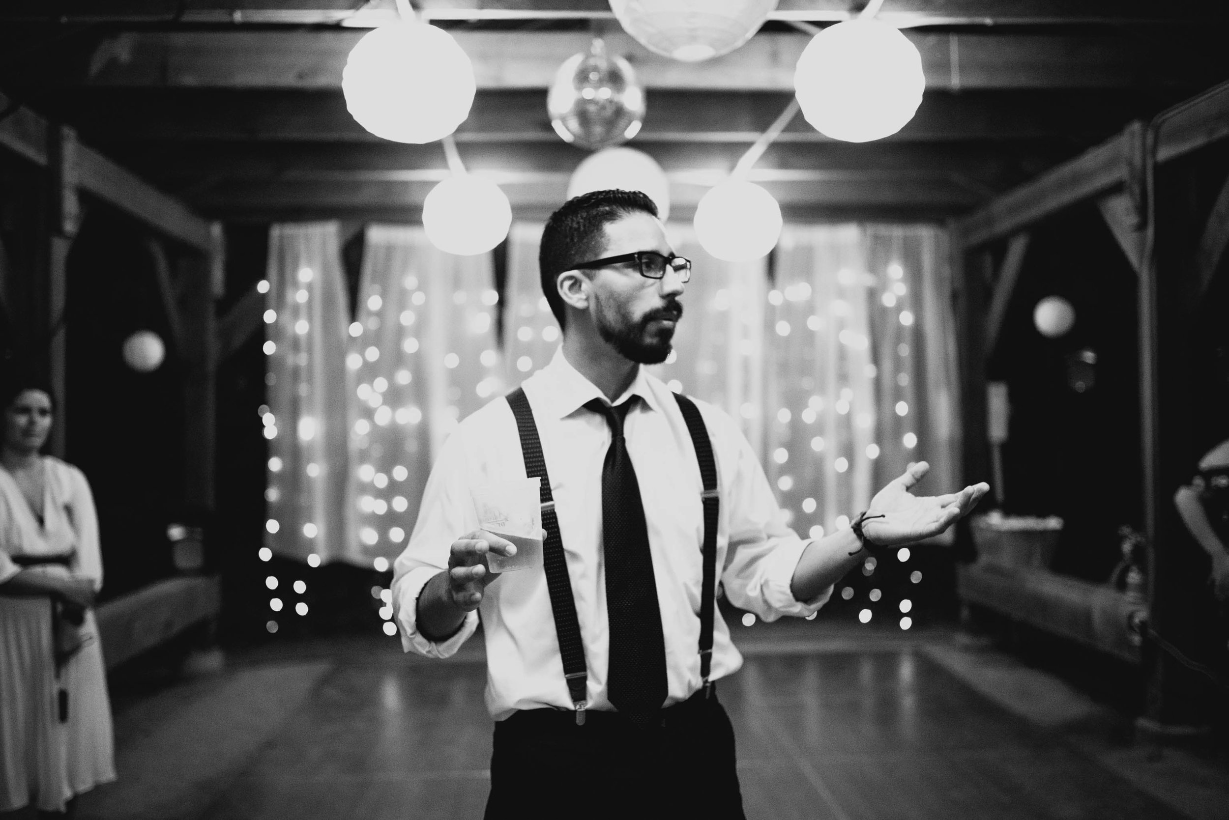 brother of the groom sharing a toast during duke forest wedding