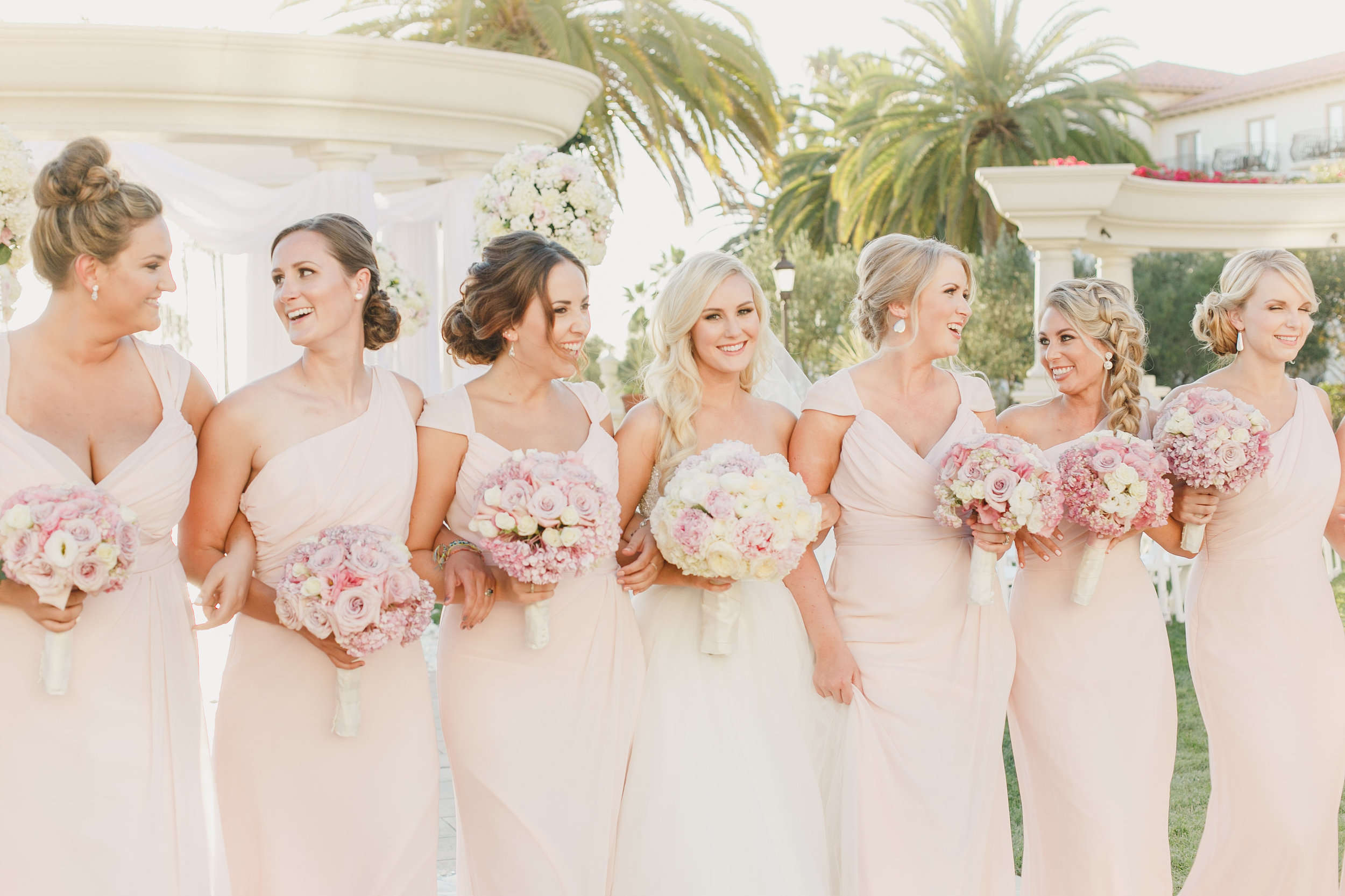  You can see the entire wedding look was soft and glamorous. Since Megan's hair was all down Genna and the DV artists braided and created soft up dos for all the bridesmaids.