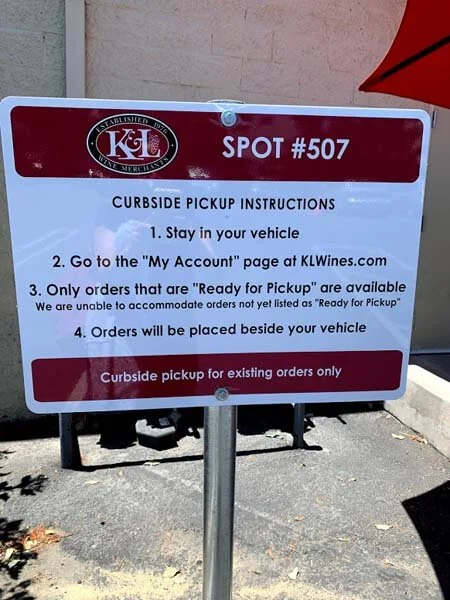 Note your vehicle number and enter it on our Order Status page at klwines.com when you arrive.