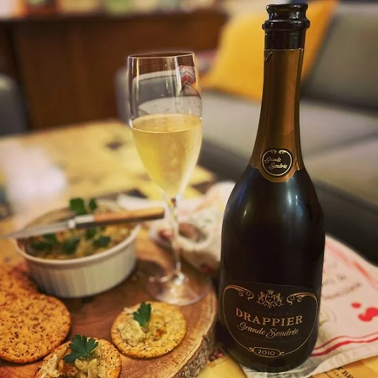 The 2010 Drappier "Grande Sendrée" is feather-light on first sip, and gains seriousness as you drink. A stunning tête de cuvée.