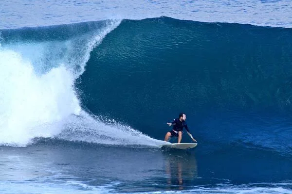 Ryan at Uluwatu in Bali, Indonesia (in the good old days!).