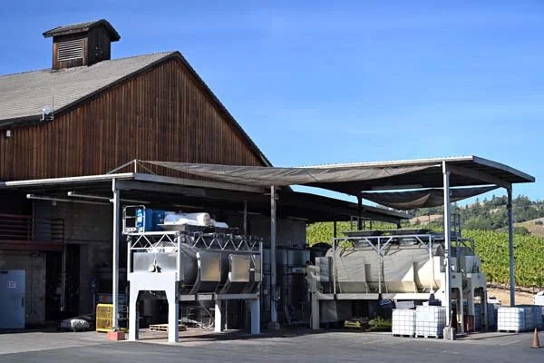 Presses being prepped for storage after completion of harvest.