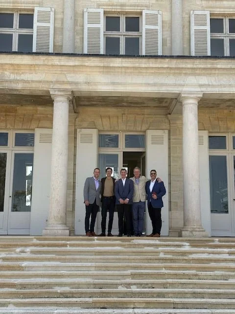 Wine experts from K&L and Bordeaux standing in front of Chateau Giscours