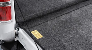 Built-in Hinge The tailgate section is connected to the Bedrug construction. The hinge covers the hinge gap to reduce debris filling the space