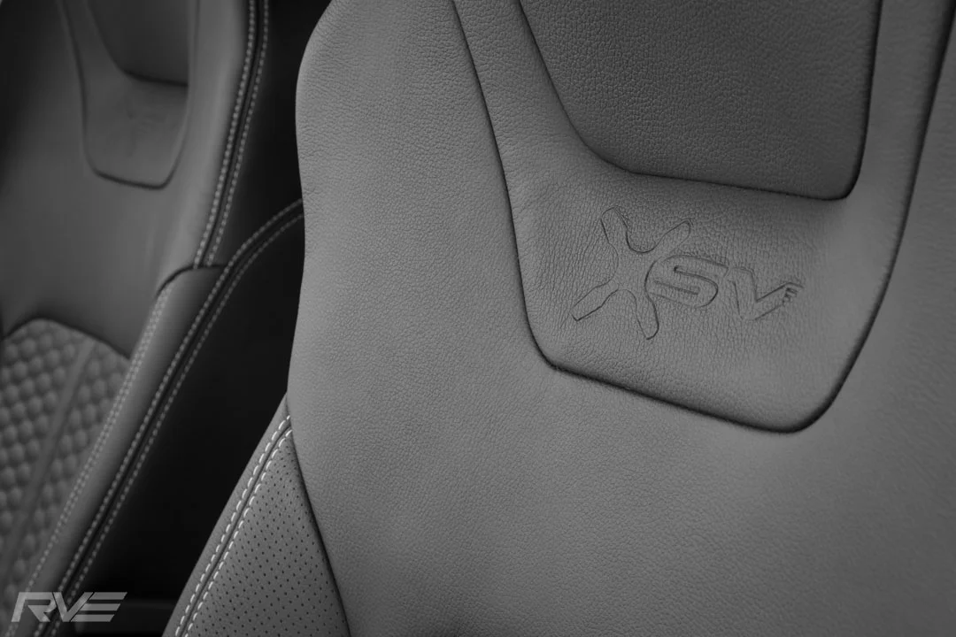 Upgraded XSV tombstone sport seating with honeycomb inserts, silver stitching and XSV embossed logos.