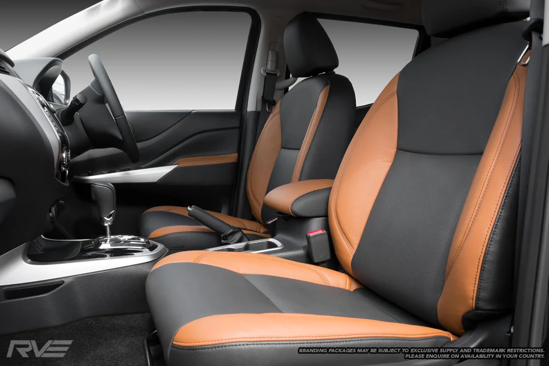 Standard seats in black leather with saddle brown bolster highlights, black stitching and perforated inserts.