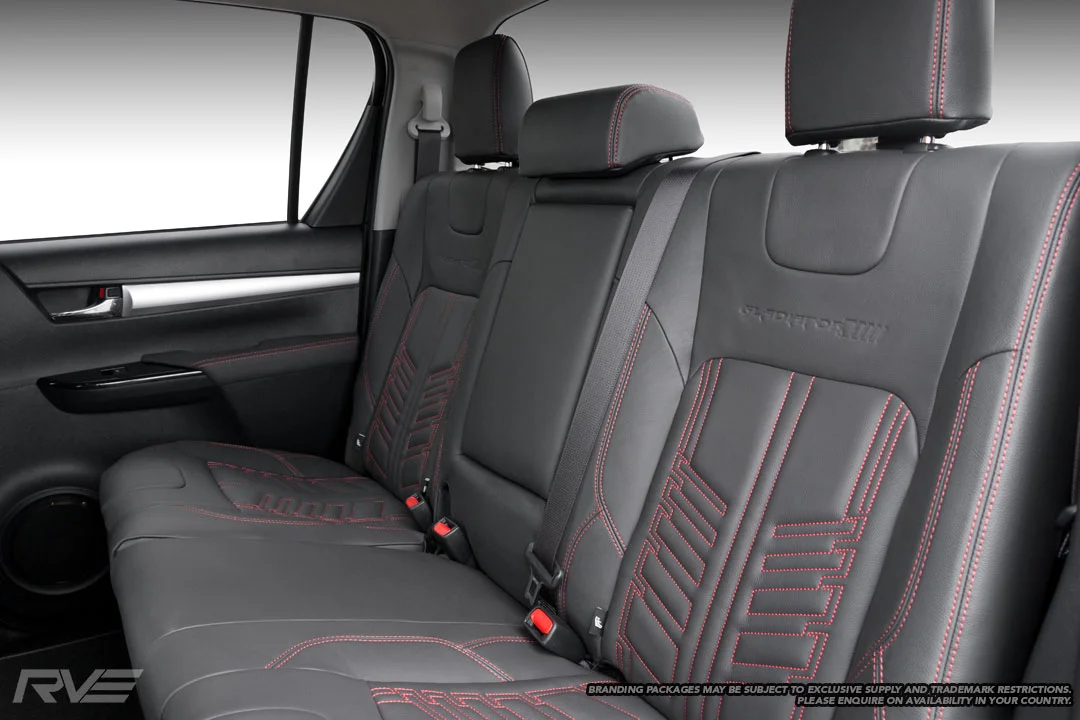 Gladiator Interior - Upgraded tombstone seats in black leather with red stitching, 'Gladiator' inserts and embossed logos.