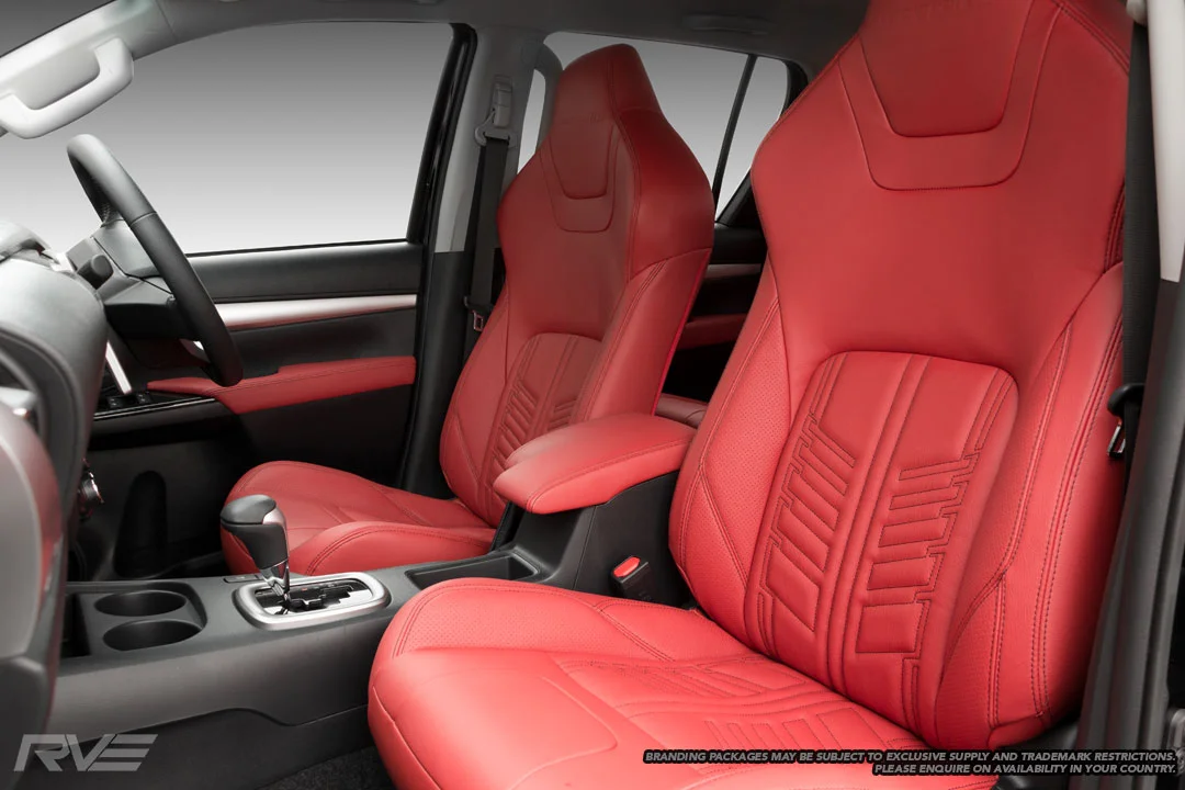 Upgraded tombstone sports seats in red leather with black stitching, perforated inner bolsters and black stitched ‘Gladiator’ inserts.