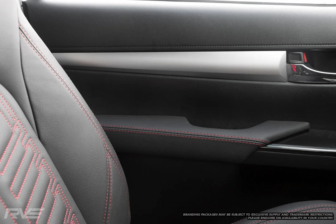 Upgraded tombstone sports seats in black leather with red stitching, embossed logos and red stitched ‘Gladiator’ inserts.