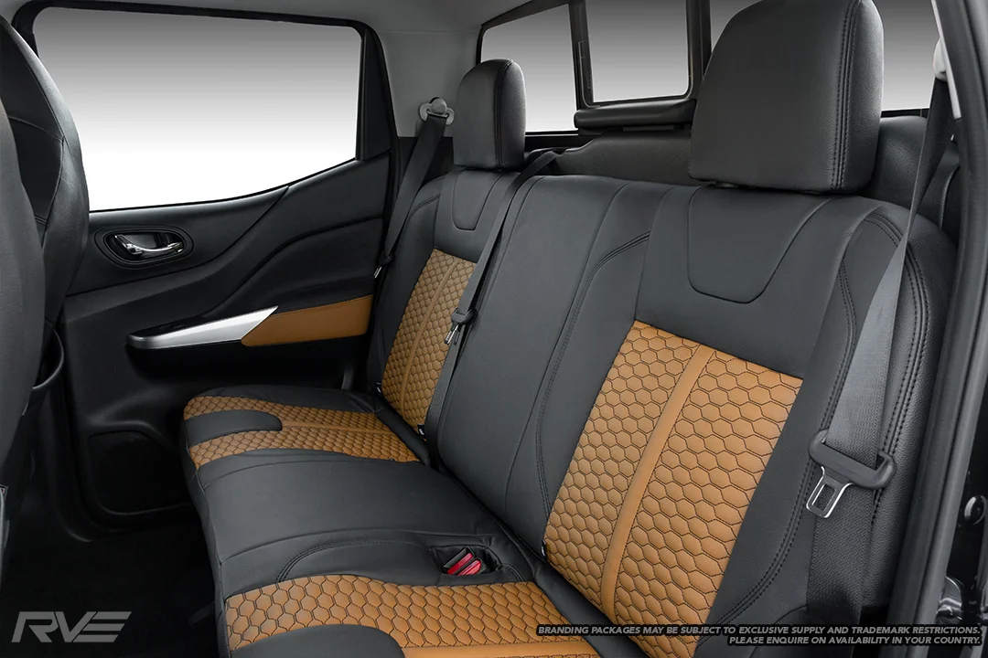 Upgraded tombstone sport seats in black leather with butterscotch honeycomb inserts and black stitching.