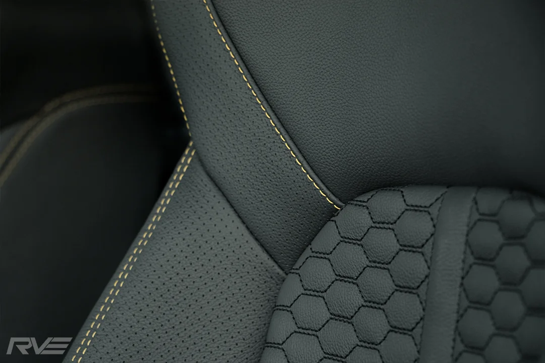 2018 VW Amarok with upgraded ‘Adventura’ style Tombstone sport seats in black leather with black stitched honeycomb inserts, perforated inner bolsters and yellow stitching.
