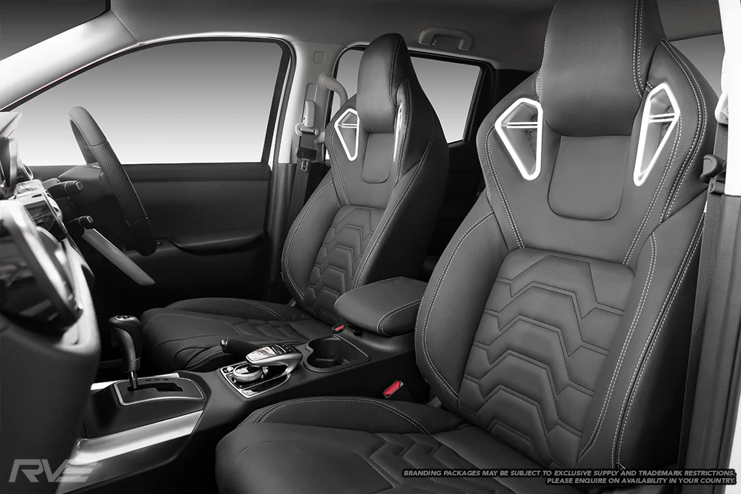 Upgraded race-inspired ‘Monza’ sport seats in black leather with silver double stitching, ‘Armour’ inserts and satin silver bolster inserts. Patent pending #NZ 746521. Design registration #424982, 424983