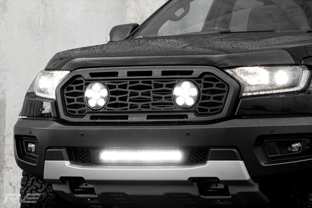 Ford Ranger Raptor with grille mesh and lights and lower grille with light bar.