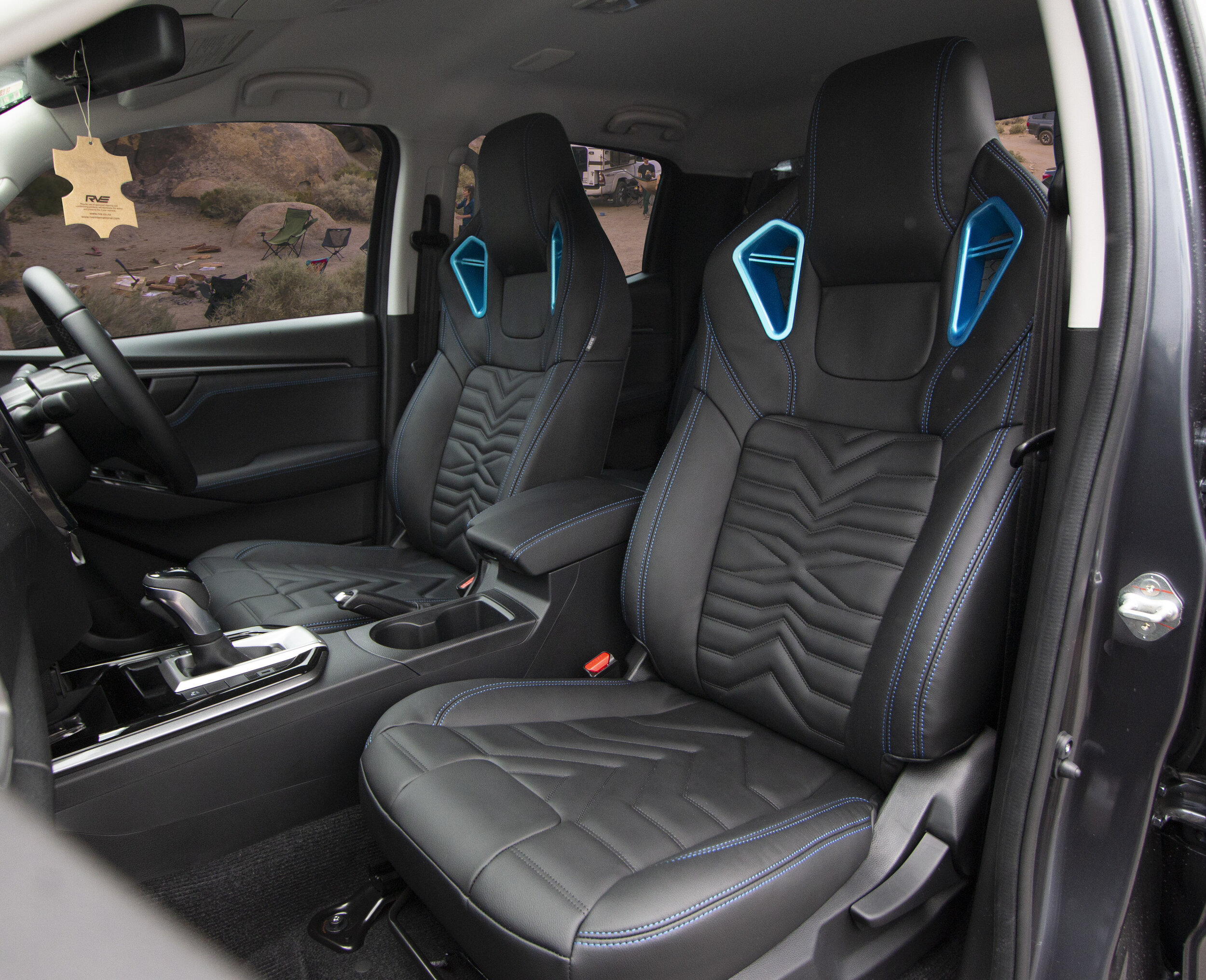 RVE Isuzu blue leather interior seats front.jpg