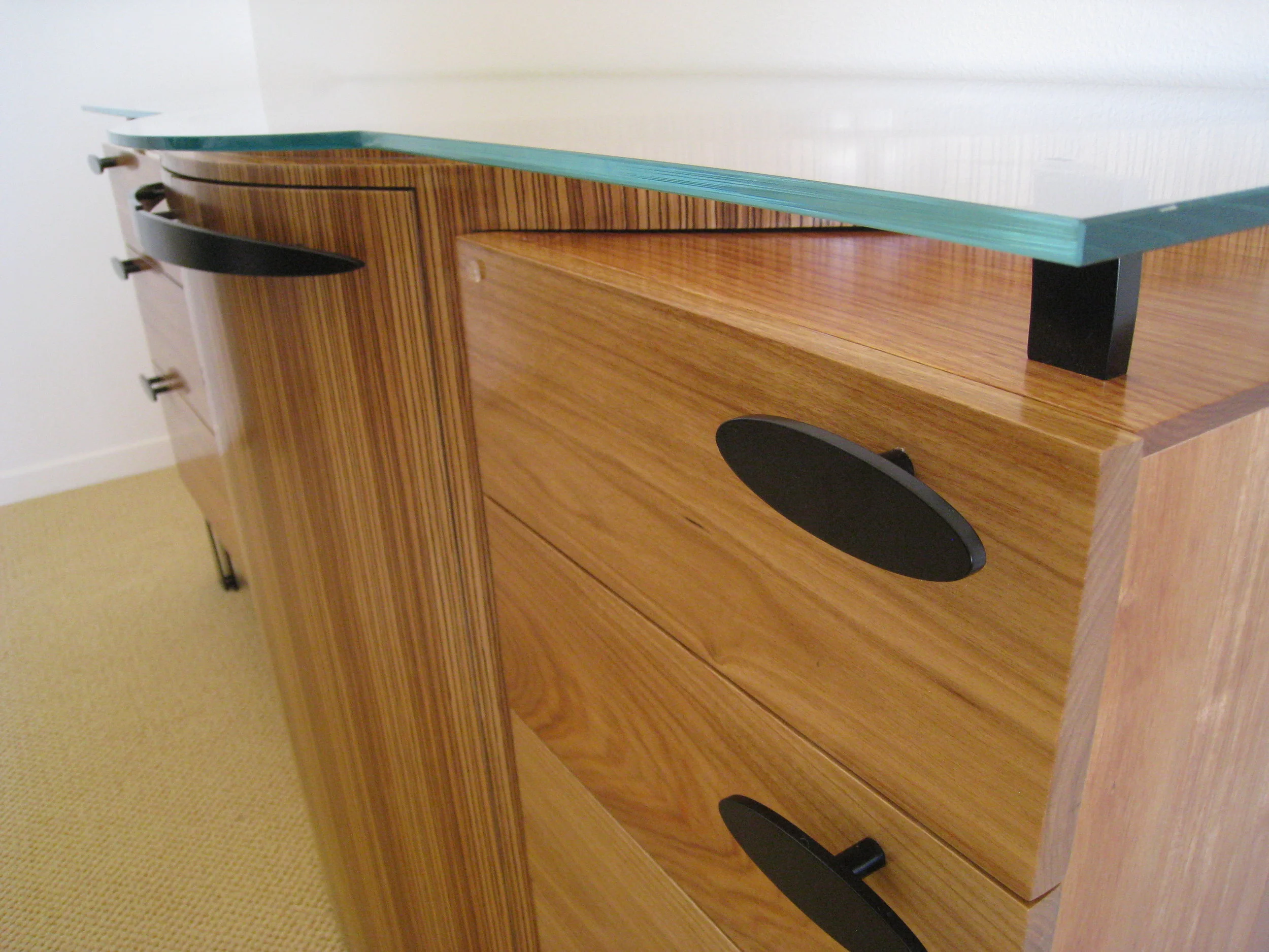  Private commission for a sideboard using steel, glass, Canary and Zebra wood 