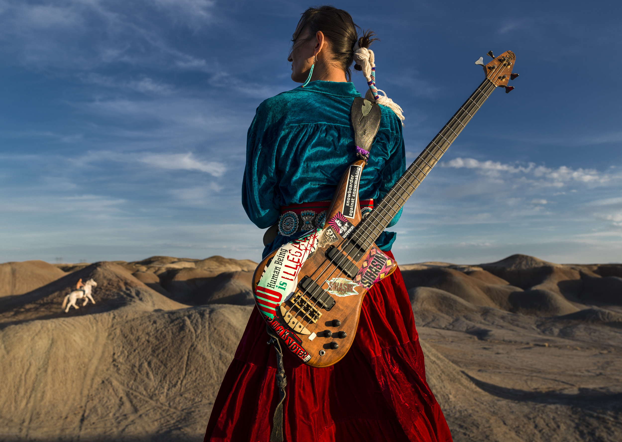 CAMERON, ARIZONA, 16 APRIL 2014: Navajo Punk rock band Sihasin is seen with their horse Moonshadow in a canyon in Cameron, Arizona. Sihasin comes from a long tradition of protest music and expouses traditional Navajo values to their audience. (Photo