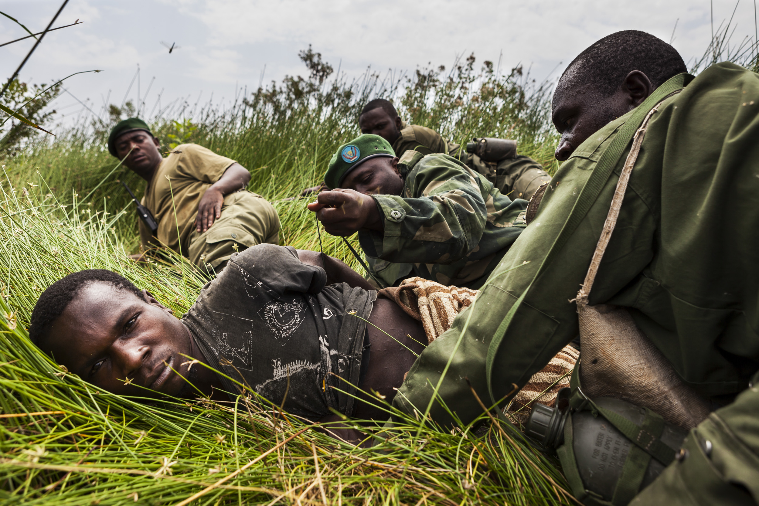 CHONDO, VIRUNGA NATIONAL PARK, DEMOCRATIC REPUBLIC OF CONGO, MARCH 2012: ICCN Congolese conservation rangers and members of the Congolese army capture illegal fisherman, Chondo, Virunga, 12 March 2012. Many of these fisherman are involved in this a