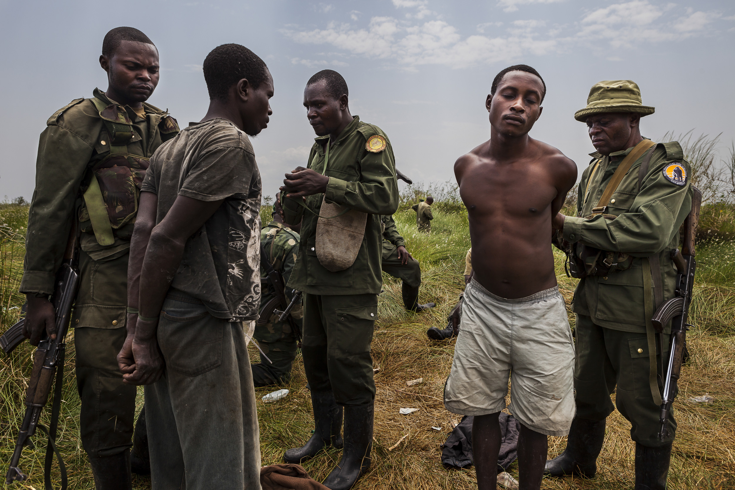 CHONDO, VIRUNGA NATIONAL PARK, DEMOCRATIC REPUBLIC OF CONGO, MARCH 2012: ICCN Congolese conservation rangers and members of the Congolese army capture illegal fisherman, Chondo, Virunga, 12 March 2012. Many of these fisherman are involved in this a