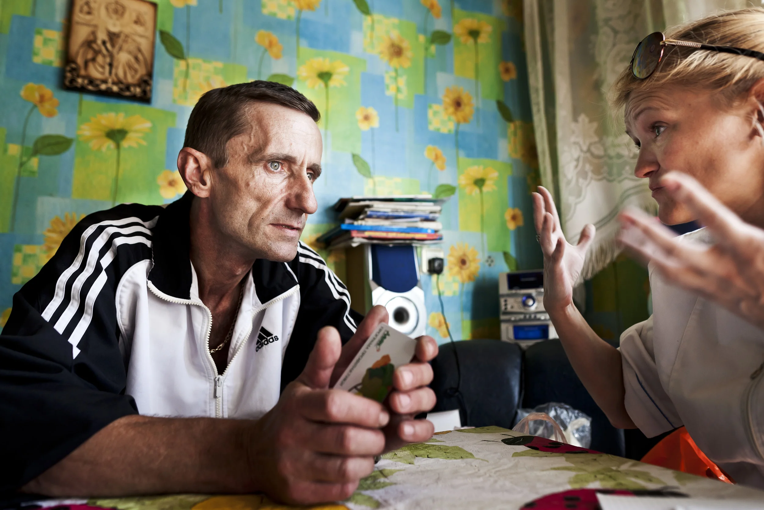 DNEPROPETROVSK, UKRAINE, AUGUST 2011: A former Surgical doctor, Olga, conducts mobile rapid testing for the Aids virus in housing projects amongst drug users, Dnepropetrovsk, Ukraine, 30 August 2011. Olga came to work in these communities because she was unknowingly infected with HIV by a surgical patient in late 2000 when she was 26. Her hospital found out at the regular 6 month testing required by surgical doctors. Olga was then asked to resign by the Chief Medical officer and when she refused was subjected to humiliating and multiple pressures at work. She was finally forced to resign after 4 months of unrelenting pressure and active rumor mongering amongst hospital staff that she had been working as a prostitute and violating her privacy by telling other about her HIV status. She spent the next two years locked away in her apartment, not daring to tell anyone and being a total recluse. Since then she has embraced her HIV + status and uses her medical training to care for disadvantaged HIV+ people in her town. (Photo by Brent Stirton/Reportage by Getty Images.)