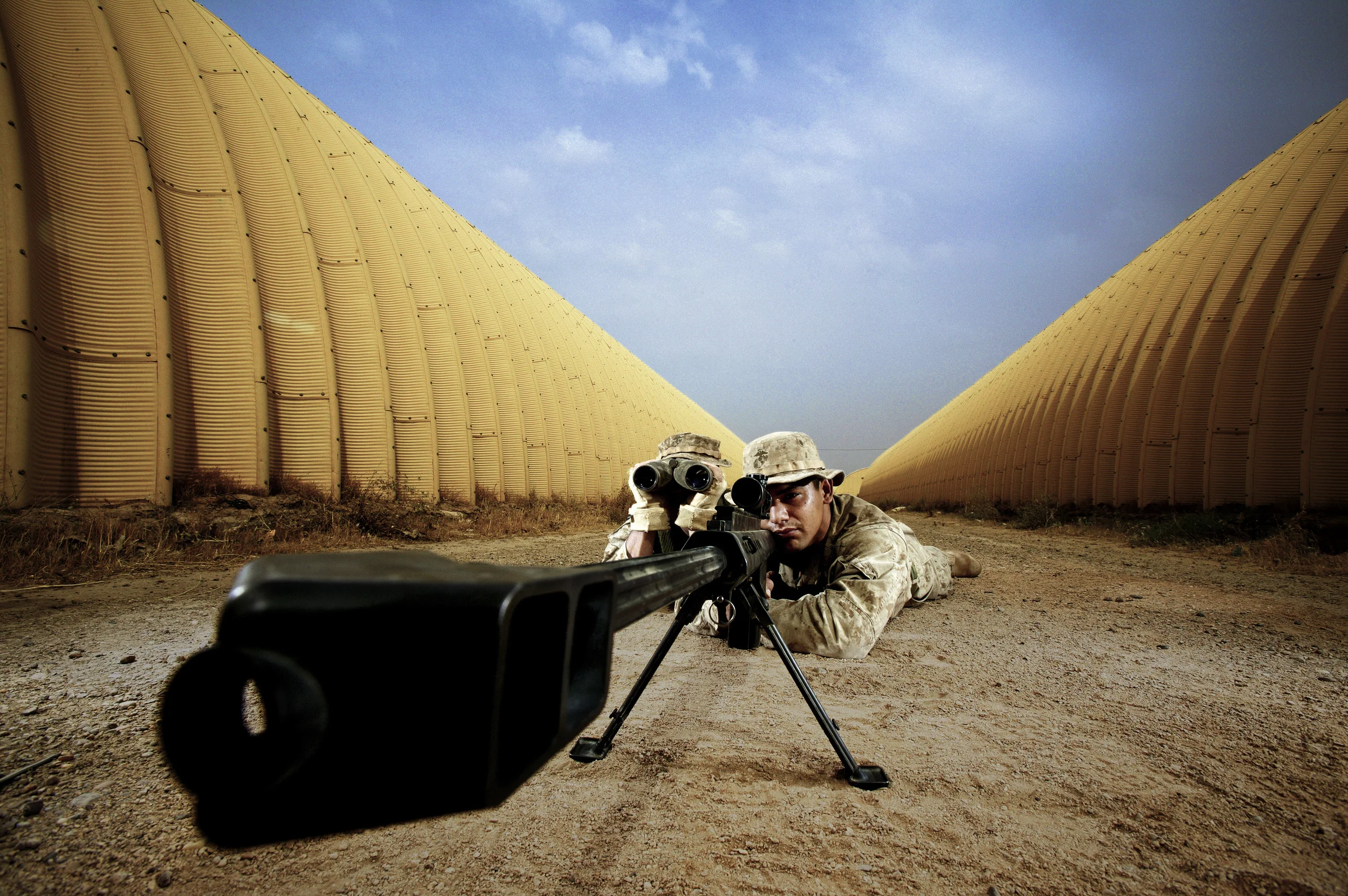 FALLUJAH IRAQ, MAY 2004: A marine sniper team set up to protect an infiltration team going into Fallujah to extract a known insurgent. PHOTO BY BRENT STIRTON/GETTY IMAGES