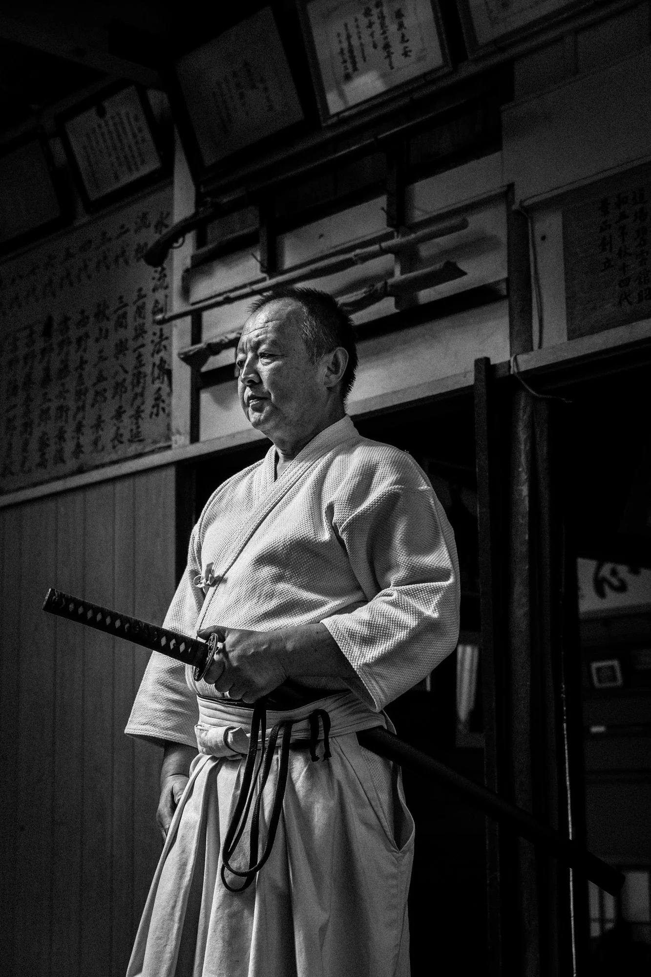 SHIMIZU KU, SHIZUOKA CITY, TOKYO, 16 OCTOBER 2014: Images from the dojo of Master Sensei Yoshimitsu (Kagehiro) Katsuse, a master of all 18 of the Samurai arts. He is known as the 15th sōke of Suiō-ryū, a form of Japanese martial arts which dates back to 1615. Katsuse Yoshimitsu Kagehir is seen with his son, his advanced students and with his collection of prestigious Katana swords. His students are seen practising their various katas. The founder's son Yohachirō succeeded his father to become the 2nd head of the tradition and the lineage has continued unbroken to the present day. Traditionally, the kage waza were shared only with the successor to the tradition, in a form of transmission called isshi sōden. However, now nearly all of the physical techniques of the tradition are taught openly. Even today though, one set of iai kata, which represent the very essence of the tradition's teachings, is set aside only for communication to the tradition's next sōke. (Photo by Brent Stirton/Reportage by Getty Images for Le Figaro Magazine.)