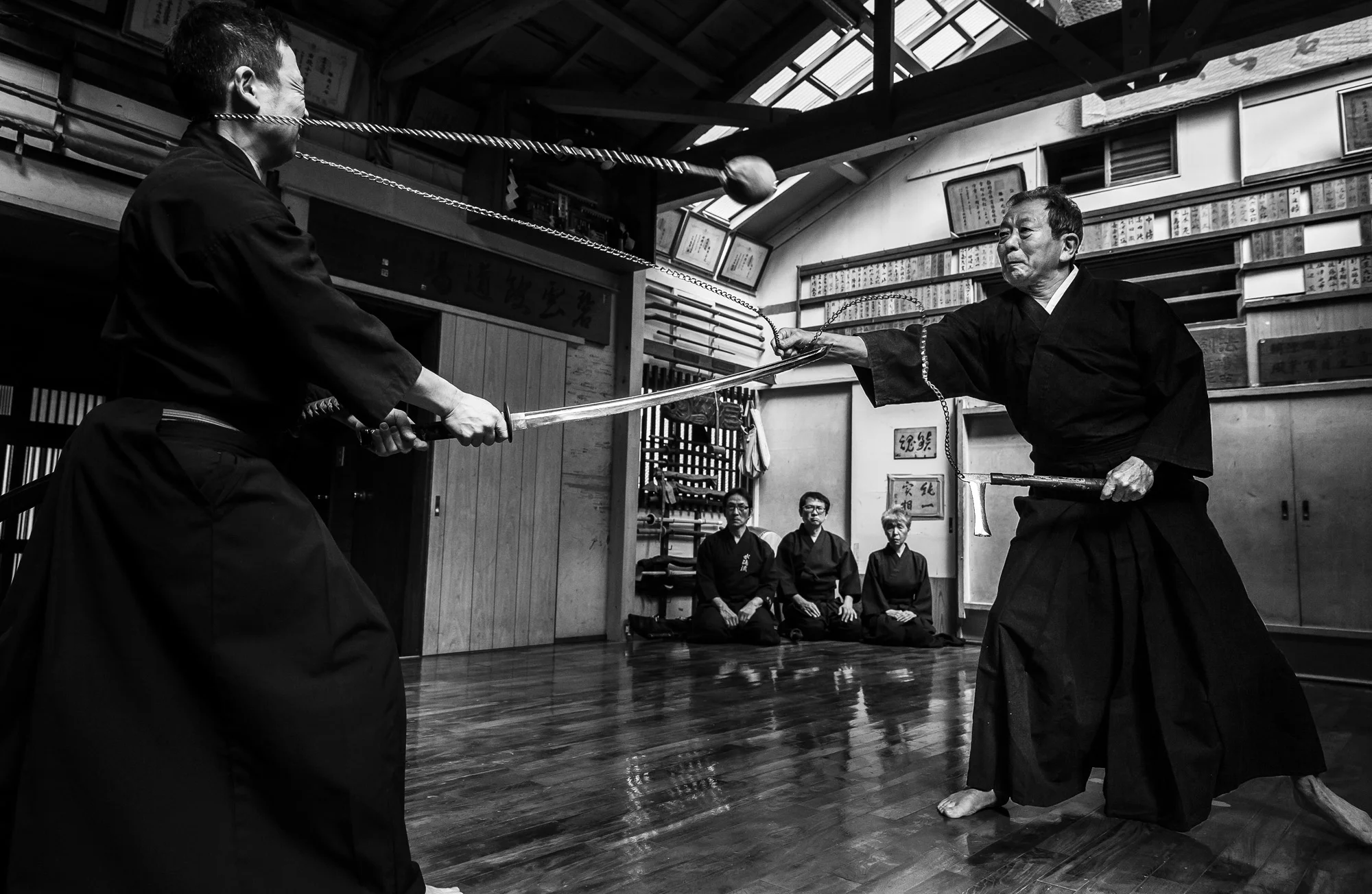 SHIMIZU KU, SHIZUOKA CITY, TOKYO, 16 OCTOBER 2014: Master Sensei Yoshimitsu Katsuse, a master of all 18 of the Samurai arts, is seen practising his skills with his son while utilizing an ancient Samurai weapon which allowed combat against skilled swordsman from a distance. Most of these skills and techniques reside in the hands of only a few Samurai masters who survive today. Their secrets are closely guarded and passed down in their entirety to only one man at a time. Sensei Katsuse is the current guardian of these techniques and can trace his line back to the 16th century.