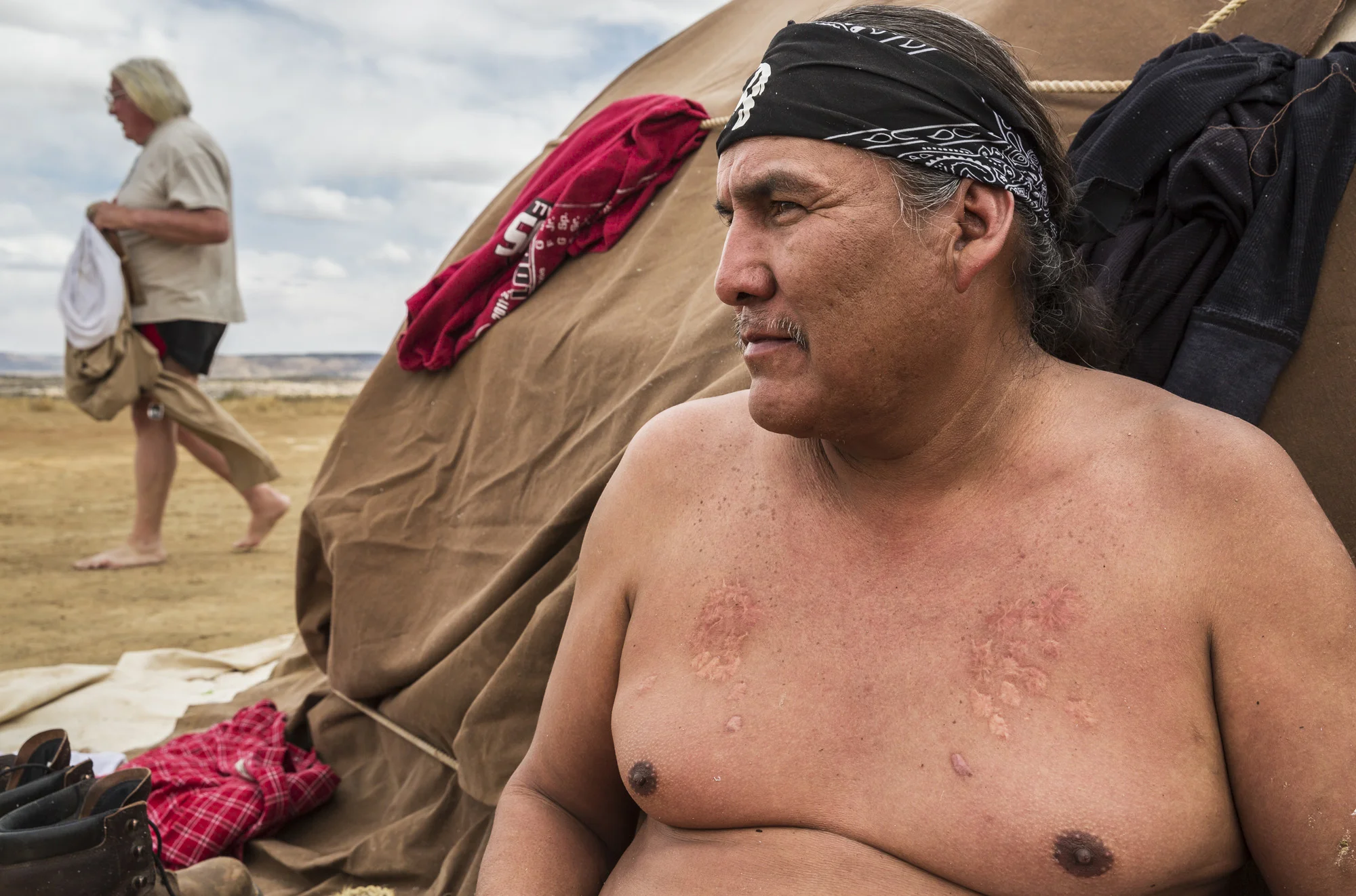PINON, NAVAJO NATION, ARIZONA, 5 APRIL 2014: Scenes from a Navajo sweat lodge and pipe smoking ceremony, Pinon, Arizona. The sweat lodge is a purification ritual involving hot rocks and sage, as well as drumming and chanting. The Pipe smoking ceremony is a giving of thanks for the four seasons and their role in nature. This ceremony is not part of traditional Navajo cultural practises but was co-opted from the Navajo relationship with the Lakota tribe. (Photo by Brent Stirton/Rpeortage for Le Figaro.)