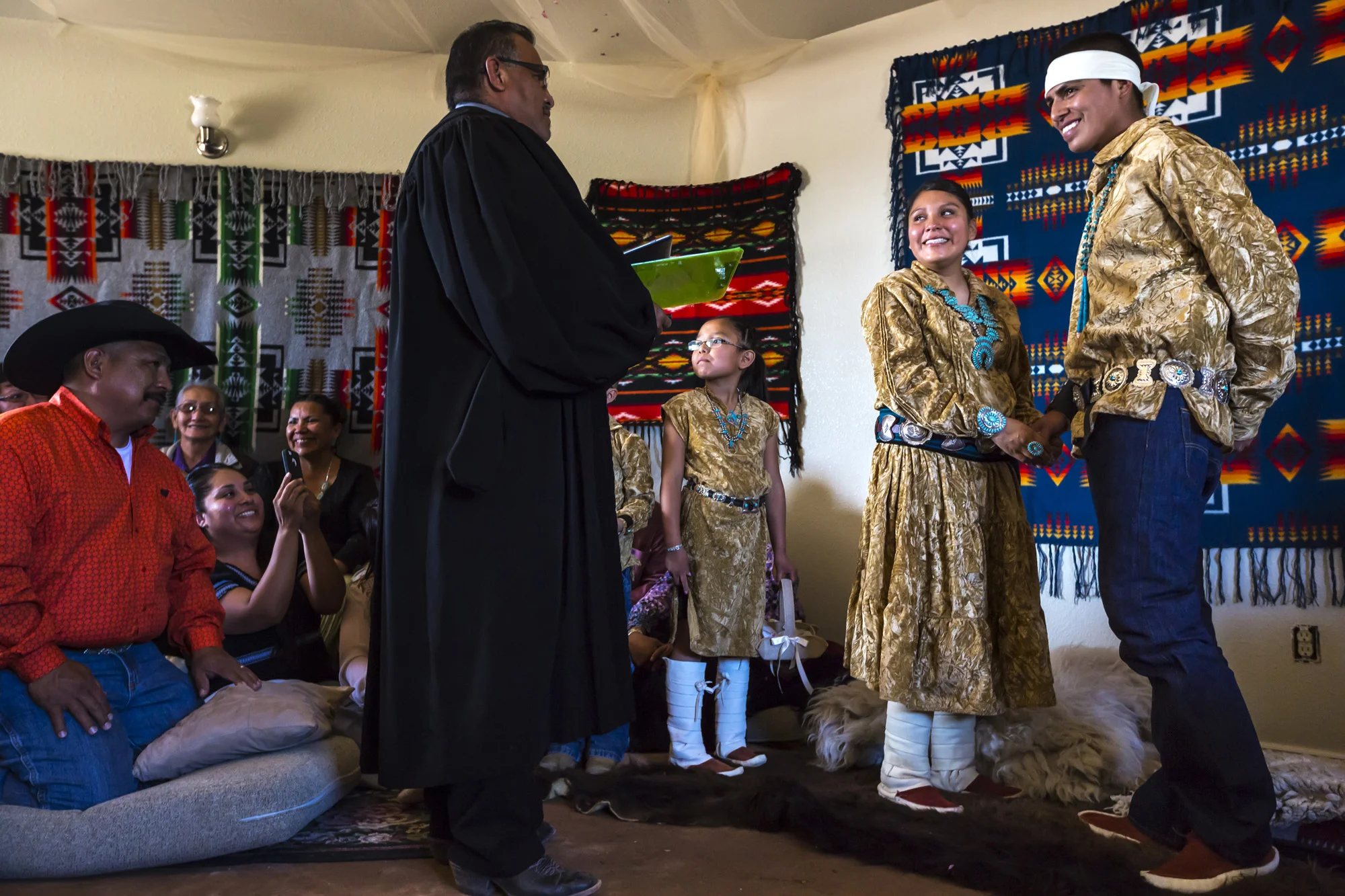 PINON, NAVAJO NATION, ARIZONA, 12 APRIL 2014: A traditional Navajo wedding which also included a civil service performed by a judge, Pinon, Arizona. The traditonal ceremony cannot be photographed but consists of corn and water coming together symbolizing success and fertility in the marriage. (Photo by Brent Stirton/Reportage for Le Figaro.)