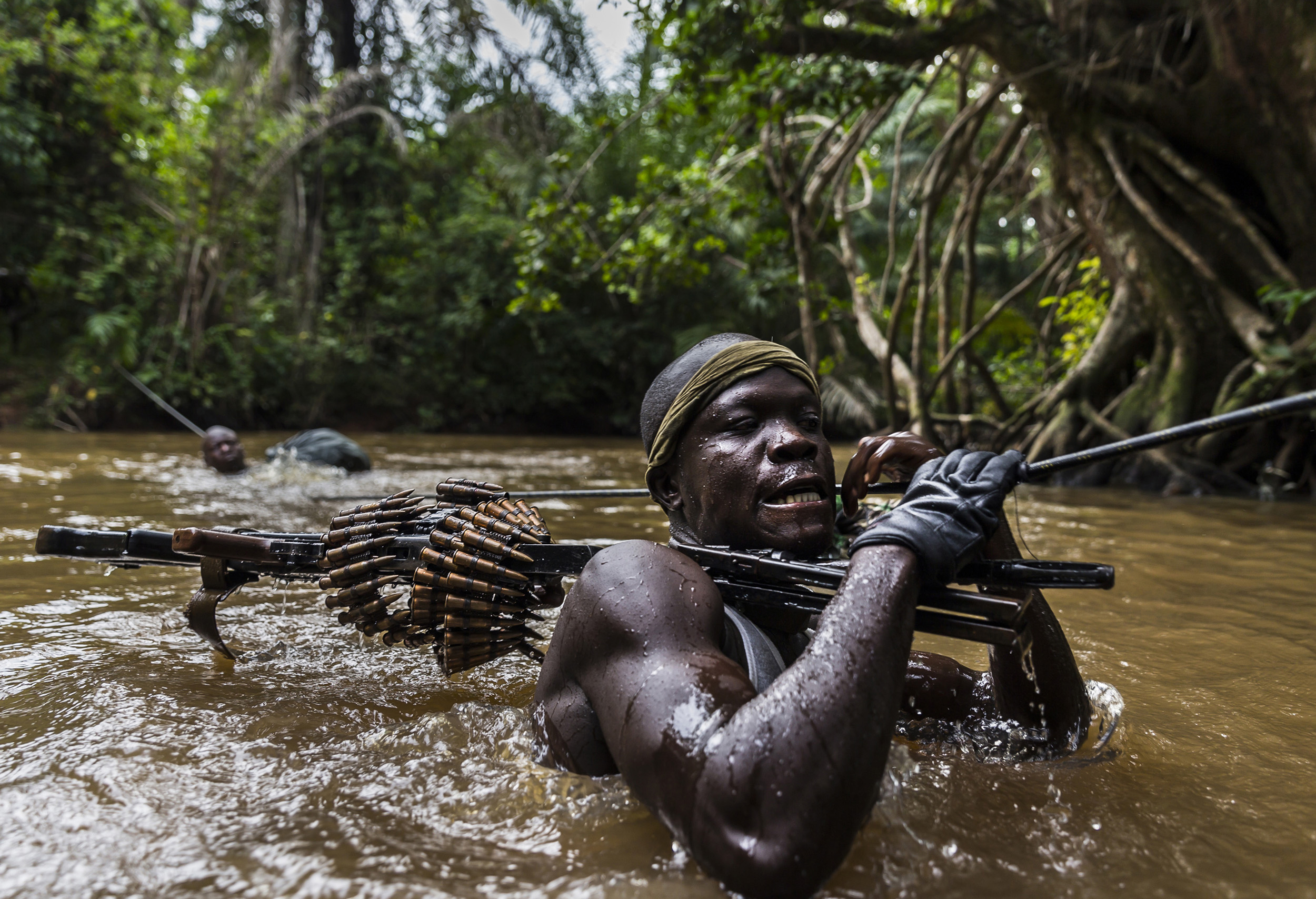 MBOKI, CENTRAL AFRICAN REPUBLIC, 25 NOVEMBER 2014: Soldiers on patrol from the African Union Ugandan Armed forces, UPDF, base at Mboki, Central African Republic. The Ugandan contingent based here are focused on the aprehension of the Lord's Resistan