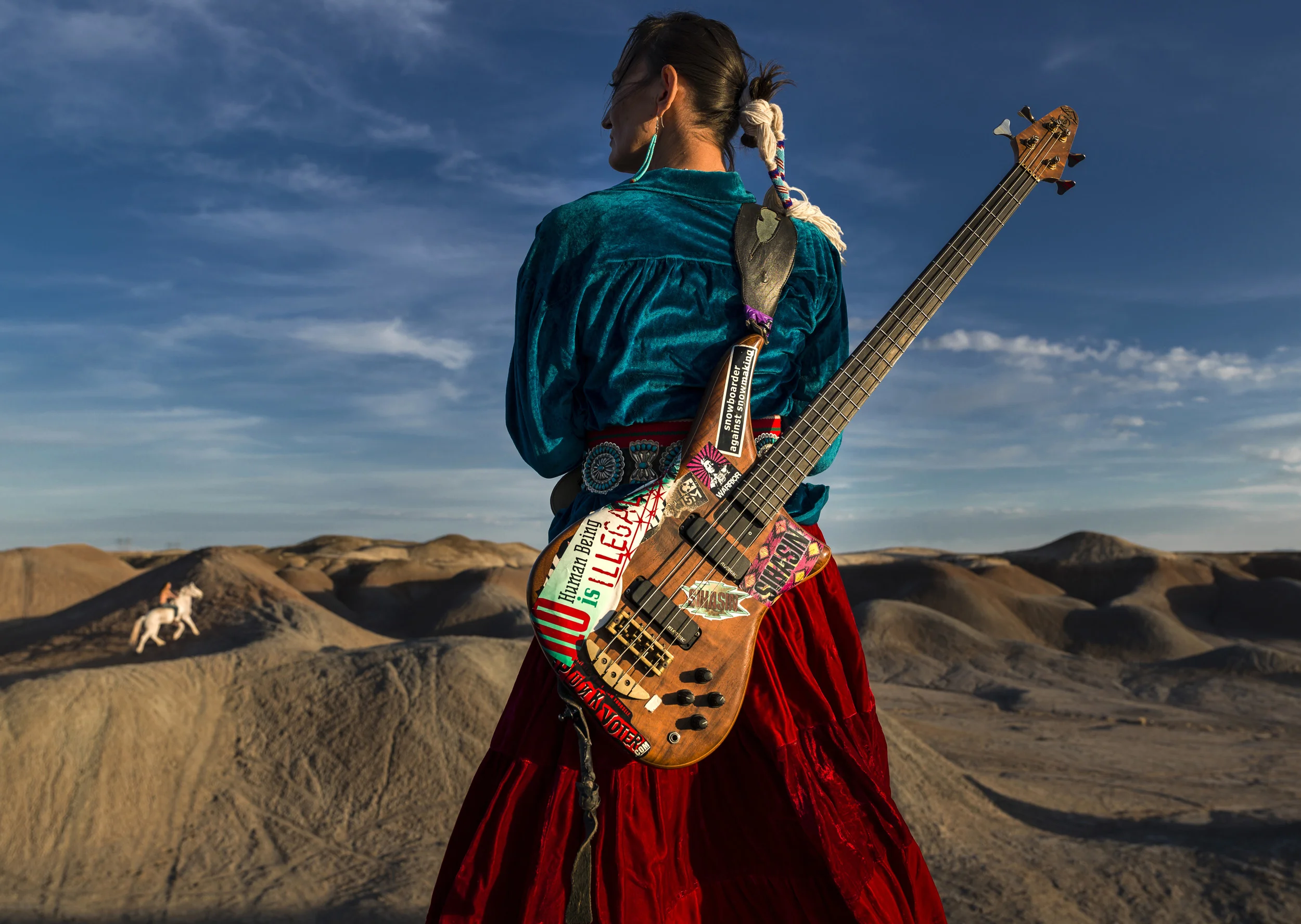 CAMERON, ARIZONA, 16 APRIL 2014: Navajo Punk rock band Sihasin is seen with their horse Moonshadow in a canyon in Cameron, Arizona. Sihasin comes from a long tradition of protest music and expouses traditional Navajo values to their audience. (Photo by Brent Stirton/Reportage for Le Figaro Magazine.)
