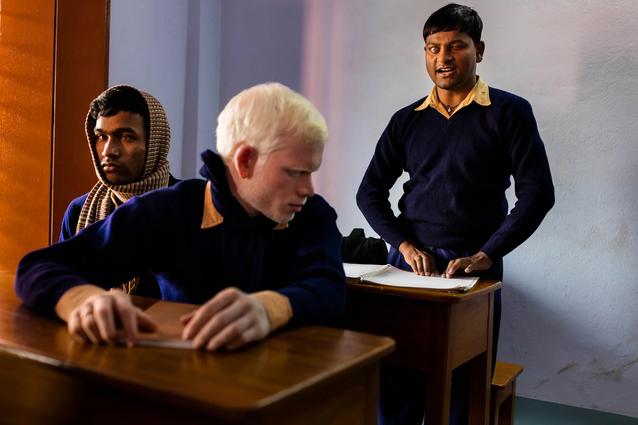 VIVEKANANDA MISSION ASRAM, HALDIA, WEST BENGAL, INDIA, JANUARY 14, 2016: Scenes with blind boys in the hostel residence of the Vivekananda Mission Asram school for the blind. This is the highest rated school for blind children in India, the country with the highest number of blind people, arond 1% of their population, approximately 12 million people. Vivekanda Mission Asram provides care to some of the poorest of blind children, providing them with an education and tools for life survival once they leave the Asram after graduating. The children learn a normal school curiculum through braile and a team of dedicated teachers. Vocationa training is also available at the Asram in weaving, candle making amongst other skills that can add meaning to a blind life in India. Most of the blind in India end up as beggars, this school offers students a chance to be more than that. A number of their students have gone on to become senior teachers for sighted pupils, lawyers and business people. In these images the boys and girls are seen attending school lessons, learning Braille, music as well as scenes from their hostel residence and sports activities. (Photo by Brent Stirton/Reportage for National Geographic Magazine.)