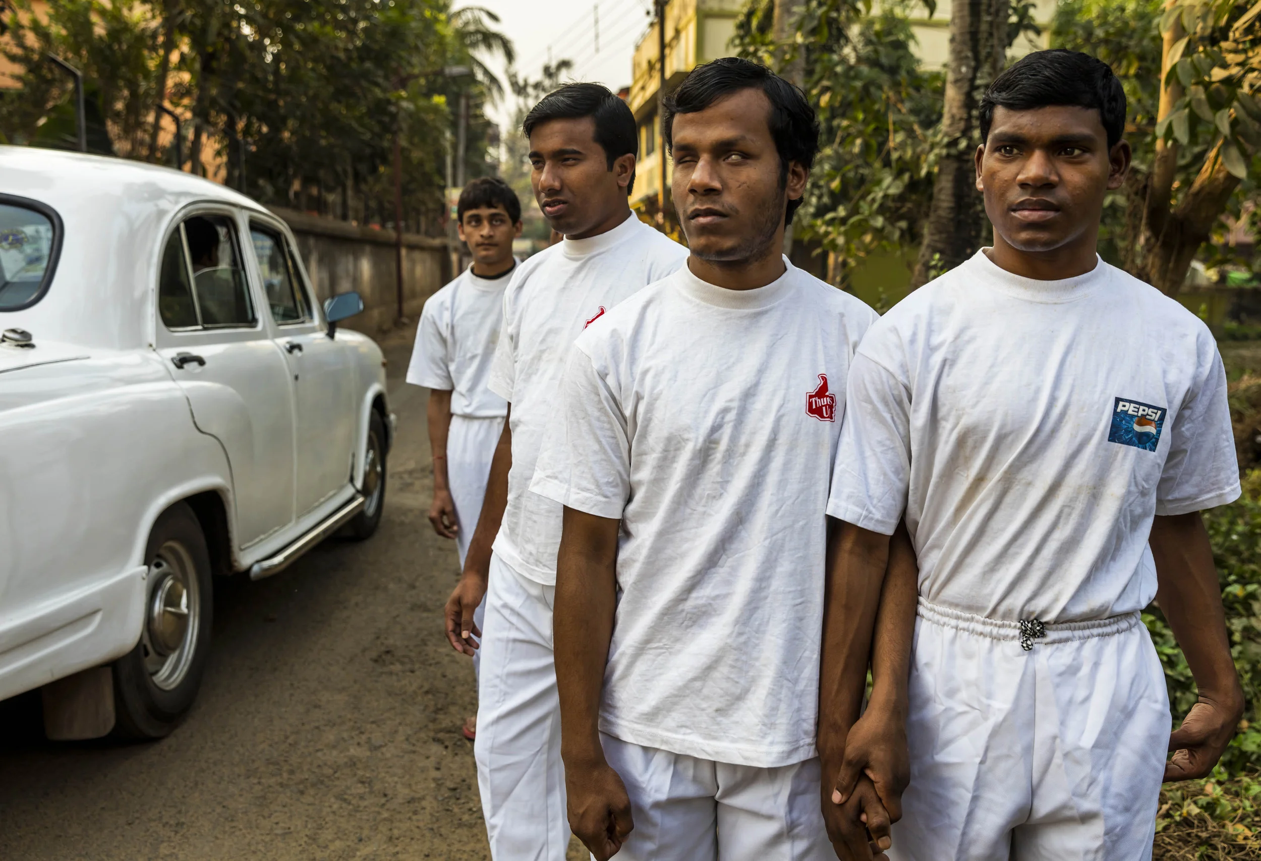 VIVEKANANDA MISSION ASRAM, HALDIA, WEST BENGAL, INDIA, JANUARY 14, 2016: Scenes with blind boys in the hostel residence of the Vivekananda Mission Asram school for the blind. This is the highest rated school for blind children in India, the country with the highest number of blind people, arond 1% of their population, approximately 12 million people. Vivekanda Mission Asram provides care to some of the poorest of blind children, providing them with an education and tools for life survival once they leave the Asram after graduating. The children learn a normal school curiculum through braile and a team of dedicated teachers. Vocationa training is also available at the Asram in weaving, candle making amongst other skills that can add meaning to a blind life in India. Most of the blind in India end up as beggars, this school offers students a chance to be more than that. A number of their students have gone on to become senior teachers for sighted pupils, lawyers and business people. In these images the boys and girls are seen attending school lessons, learning Braille, music as well as scenes from their hostel residence and sports activities. (Photo by Brent Stirton/Reportage for National Geographic Magazine.)