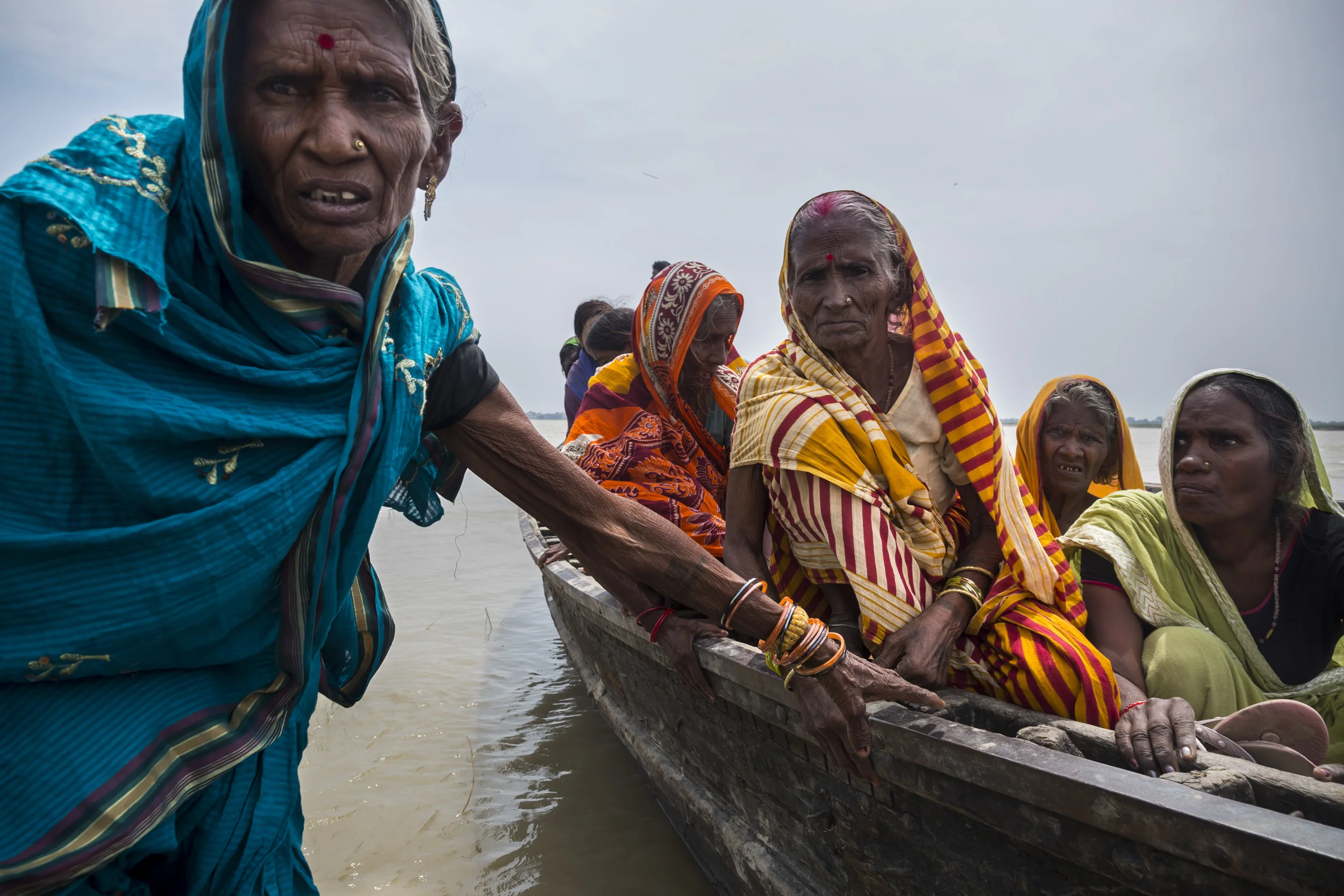 PATNA, INDIA, 10 SEPTEMBER 2014: Blind Indian boy Dablu Kuma, 8, and his mother make their way to and from a blindess camp on a remote river island where he is diagnosed with Cataracts and sent to hospital for surgery. (Photo by Brent Stirton/Reportage by Getty Images.)