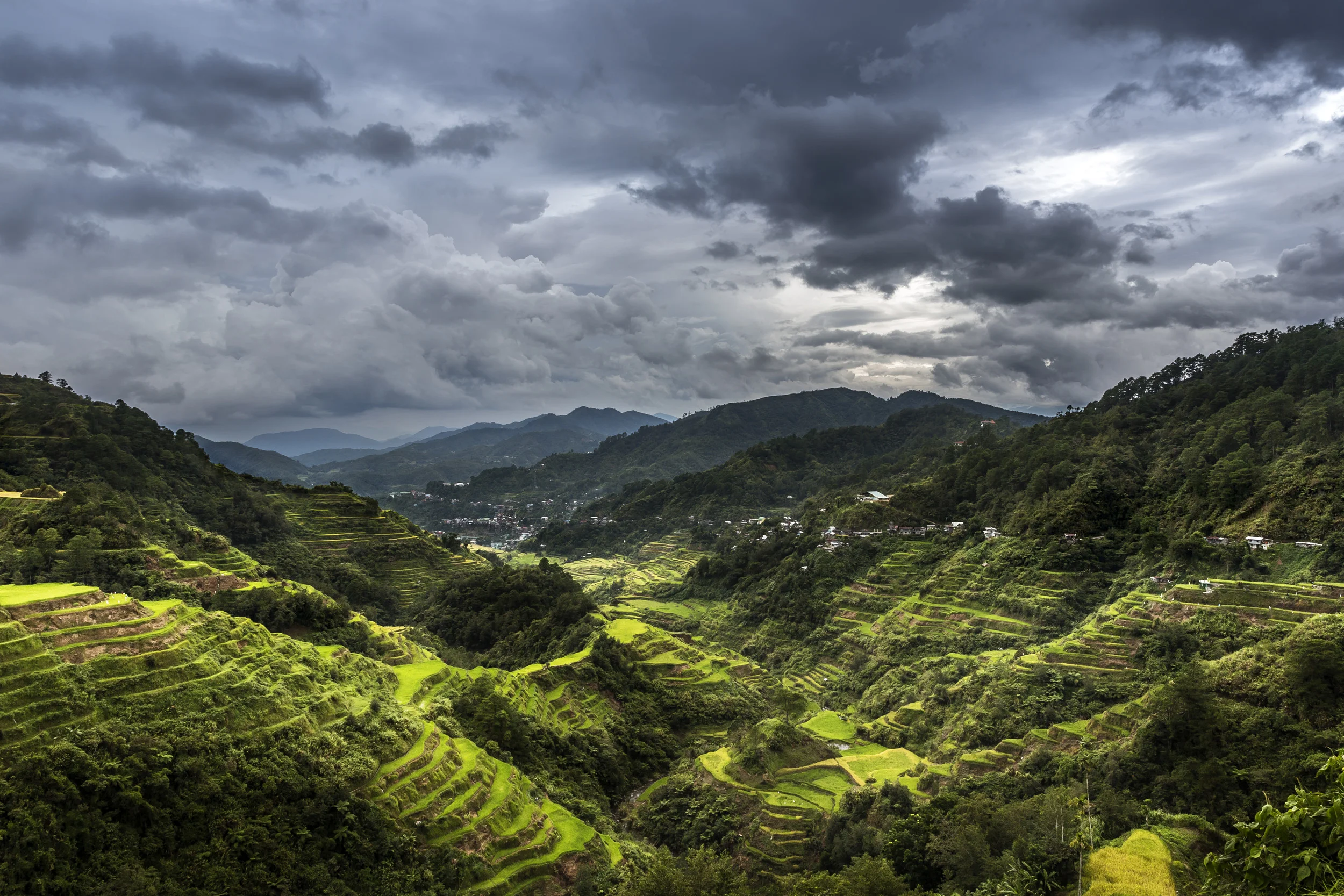 BANAUE, PHILIPPINES: The Banaue Rice Terraces are 2,000-year-old terraces that were carved into the mountains of Ifugao in the Philippines by ancestors of the indigenous people. The Rice Terraces are commonly referred to as the "Eighth Wonder of the World". It is commonly thought that the terraces were built with minimal equipment, largely by hand. The terraces are located approximately 1500 metres (5000 ft) above sea level. They are fed by an ancient irrigation system from the rainforests above the terraces. (PHOTO BY BRENT STIRTON/REPORTAGE BY GETTY IMAGES FOR CROP TRUST.)
