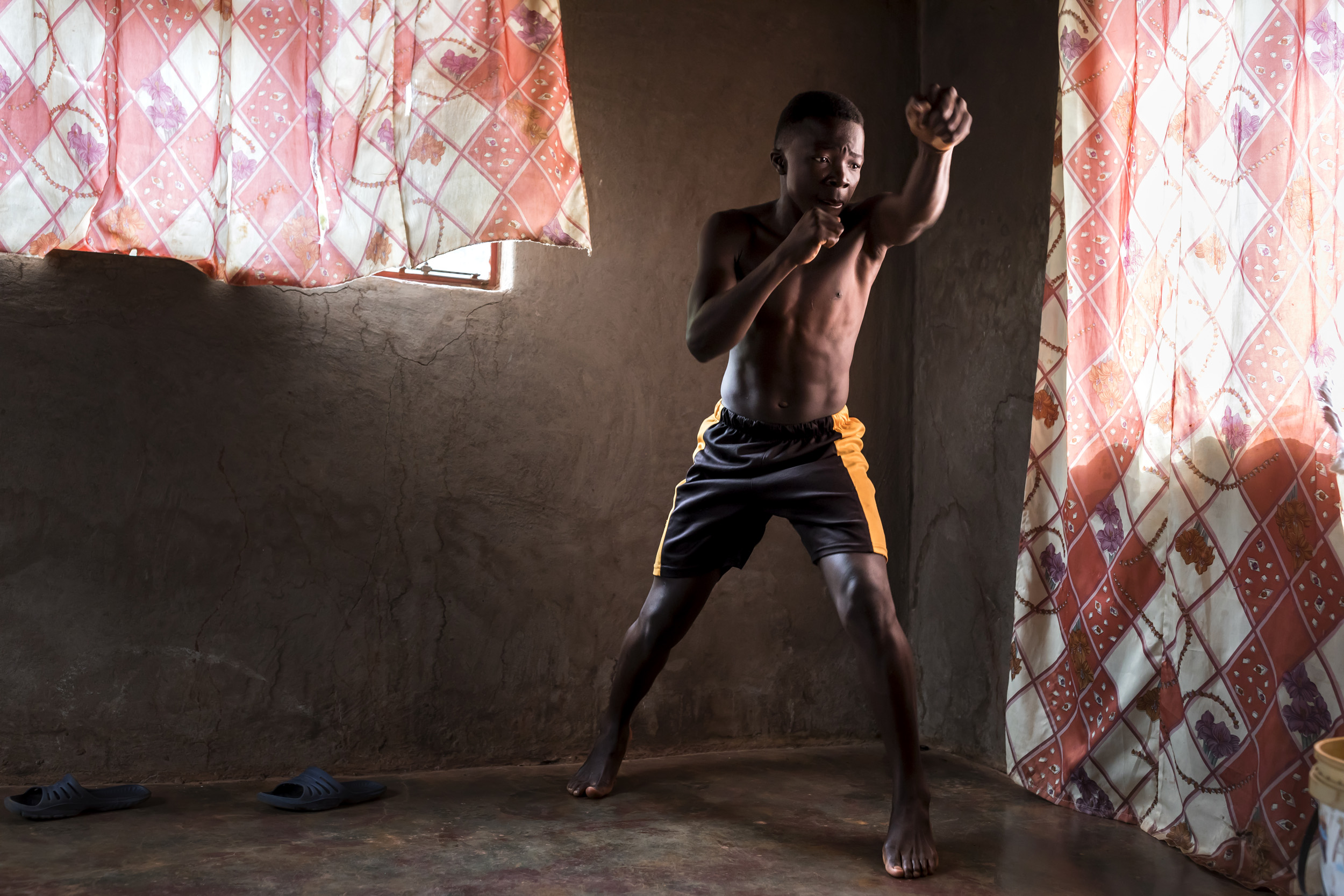 VENDA, SOUTH AFRICA, 11 DECEMBER 2016: Tshumelo “Killer” Makhado, 15, a young up and coming Musangwe fighter. Musangwe is traditional bare knuckle boxing which occurs in Venda every Xmas period. Killer is hoping to become a professional boxer but is