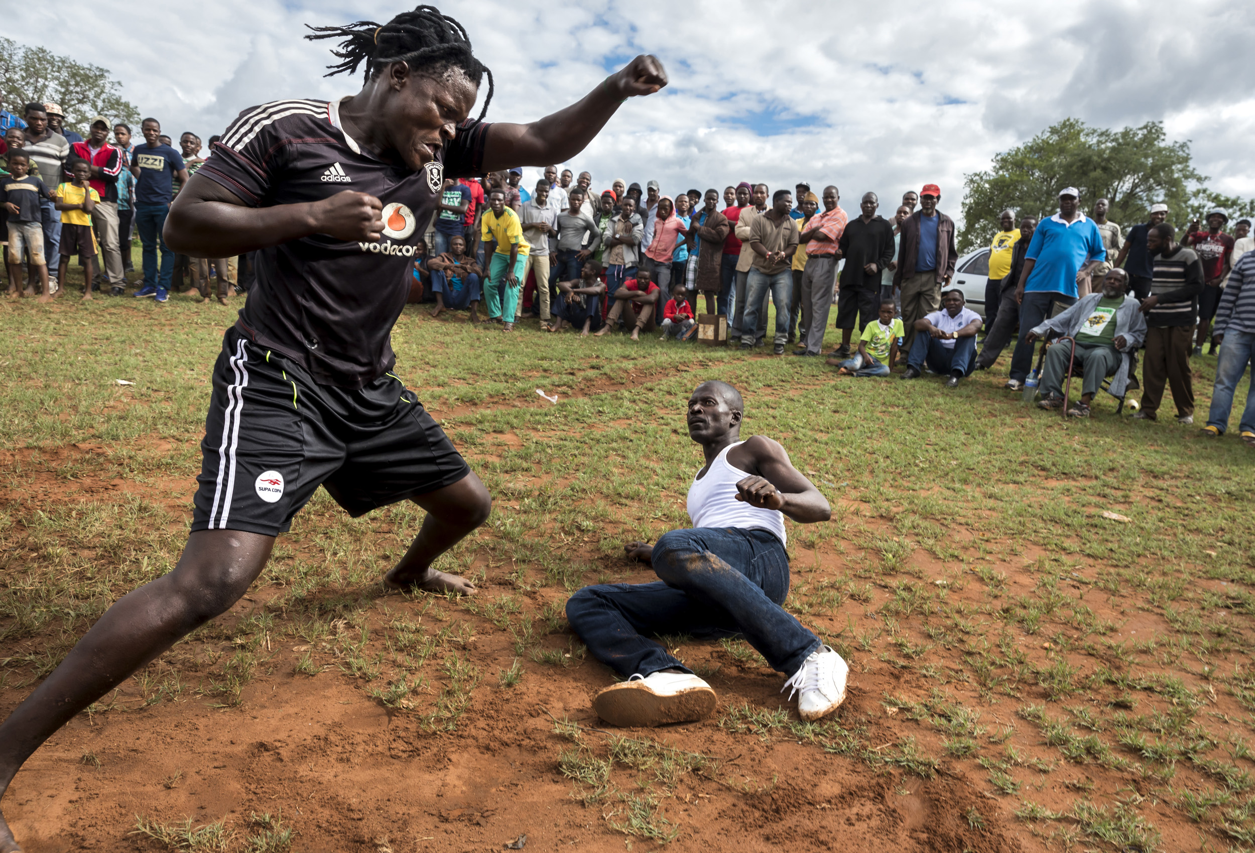 TSHIFIDI, VENDA, SOUTH AFRICA, 15 DECEMBER 2016: Men and boys of the Venda tribe challenge each other and fight bare knuckle over the festive period in South Africa. This is a tradition that dates back 200 years and began when herd boys tried to get