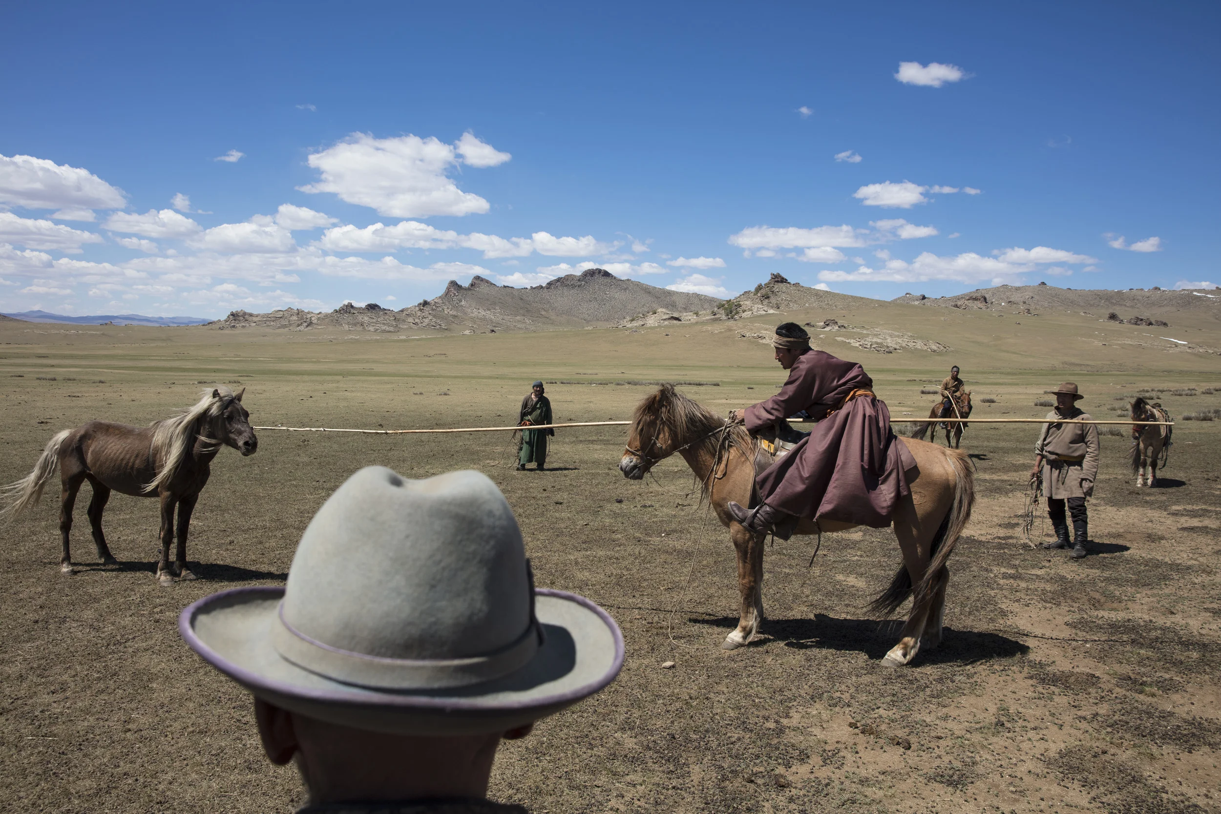 ERDENE SANT, CENTRAL MONGOLIA: Scenes with local nomads breaking in a new horse. (Photo by Brent Stirton/Verbatim for National Geographic Magazine.)